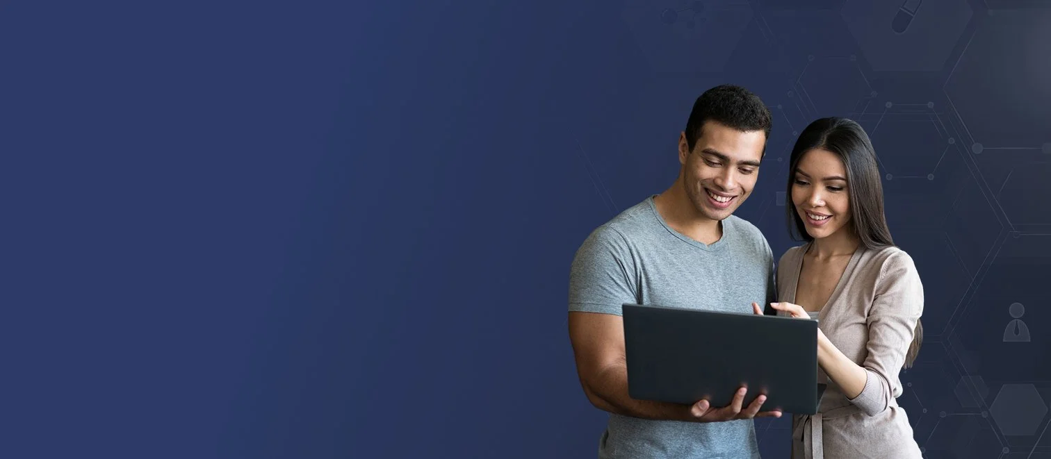 A man and woman looking at a laptop screen together, smiling, standing against a dark blue background with a digital network pattern.