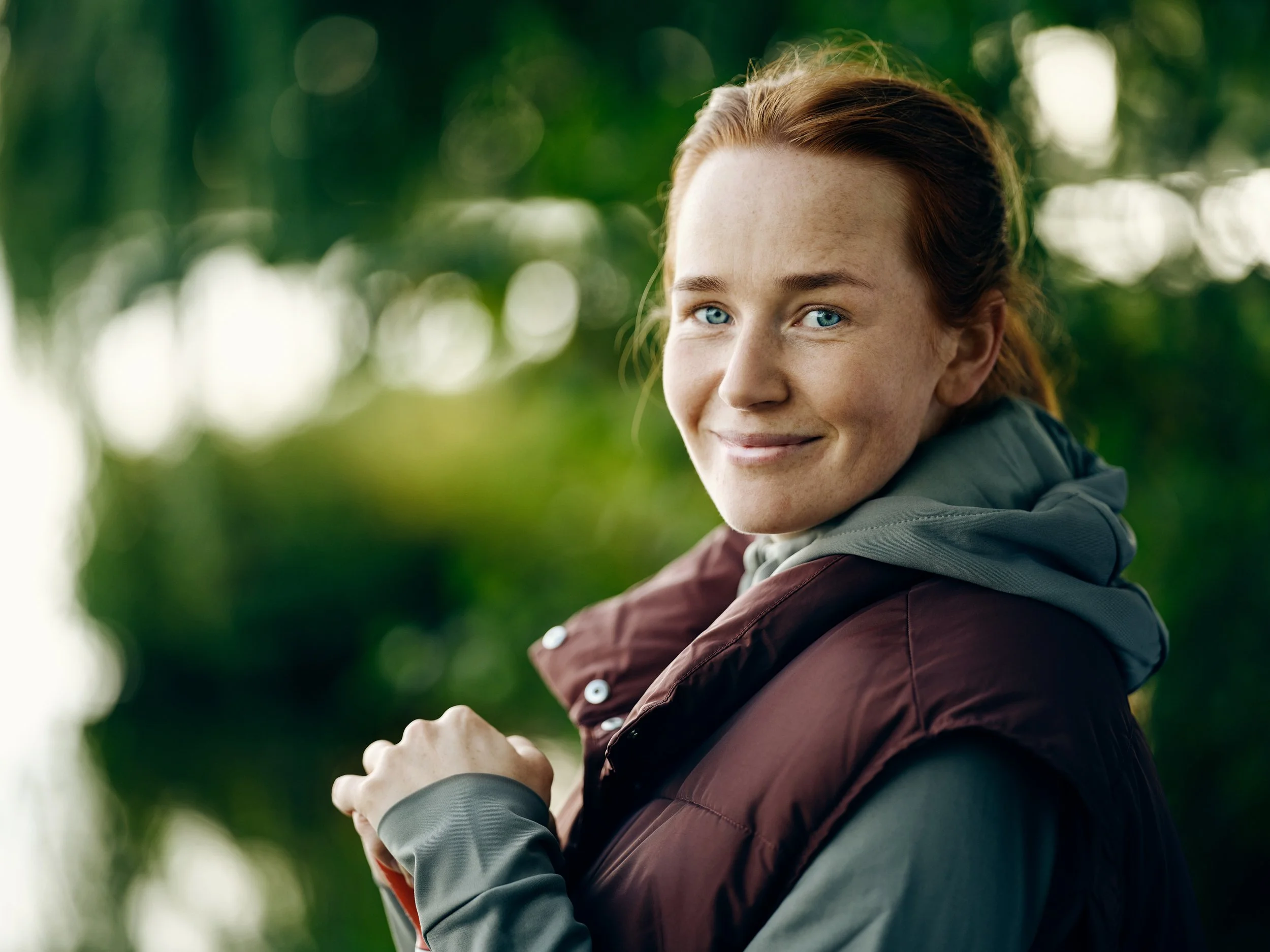 Woman outdoors , relaxed moment in everyday setting