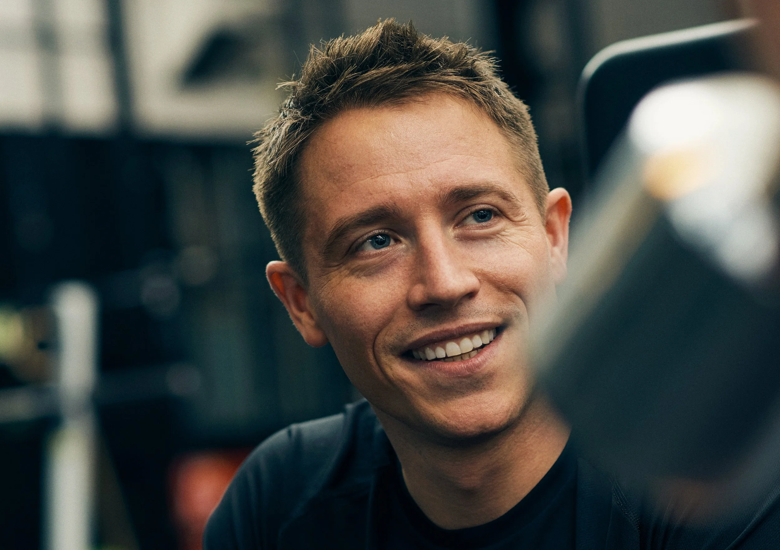 Portrait of man in gym environment, natural expression