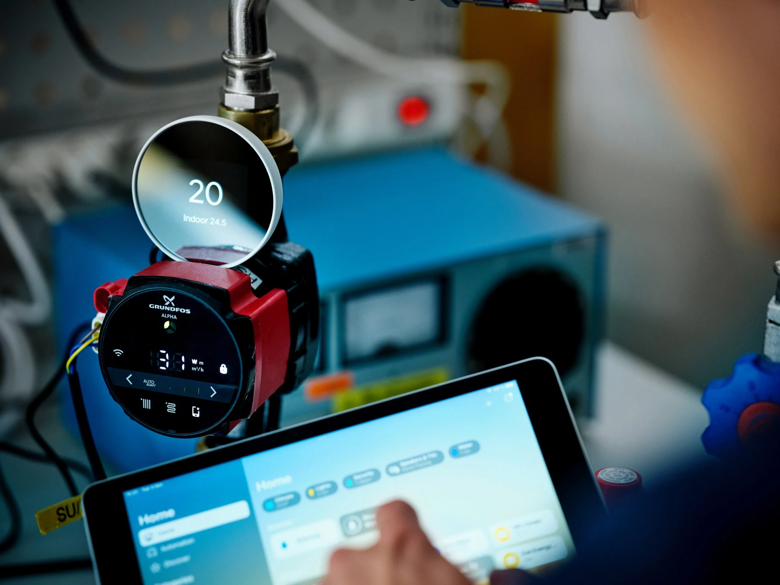 Digital pump interface connected to testing system, technician controlling setup via tablet