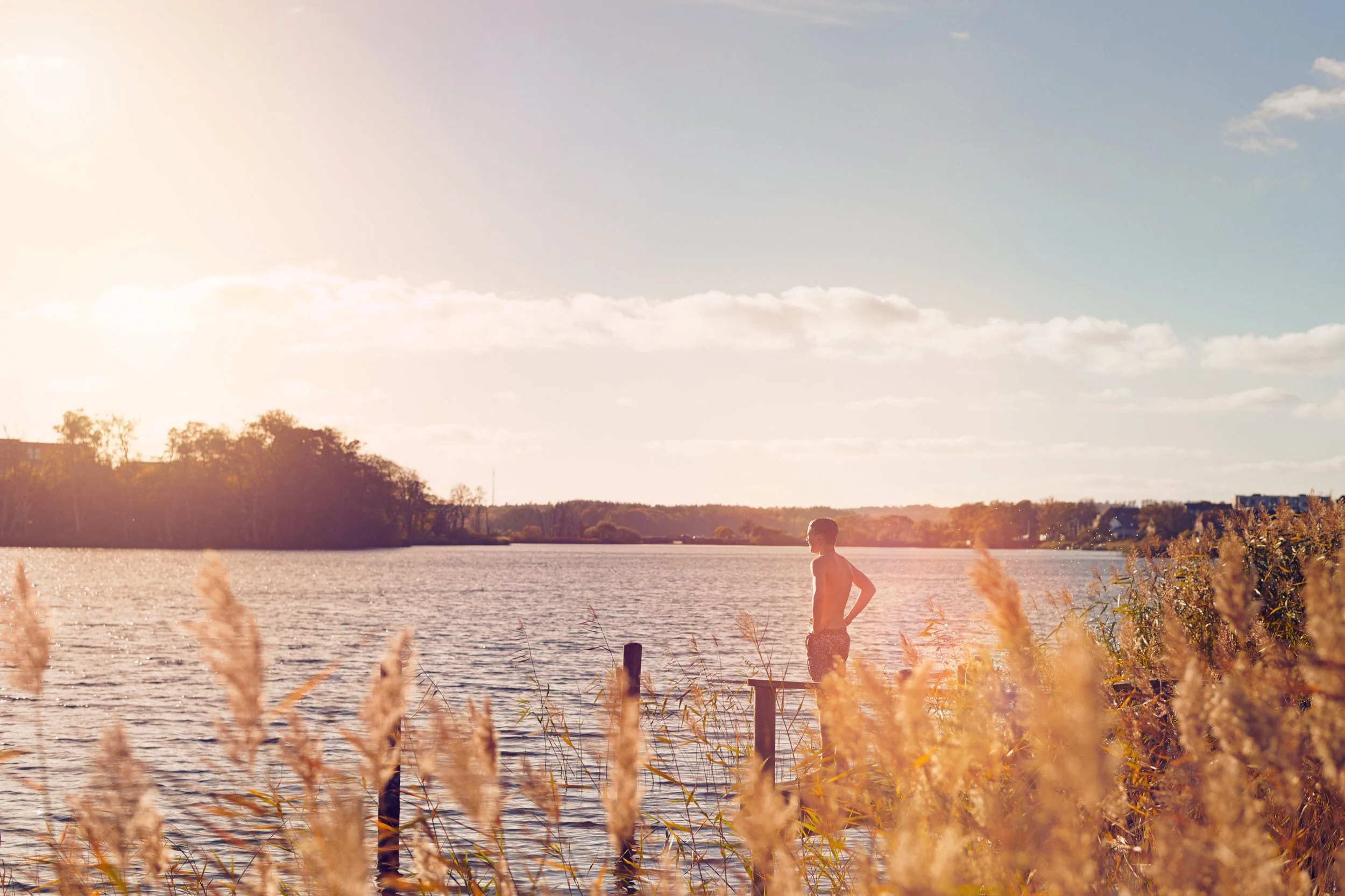 Calm lake landscape at sunset, quiet natural environment