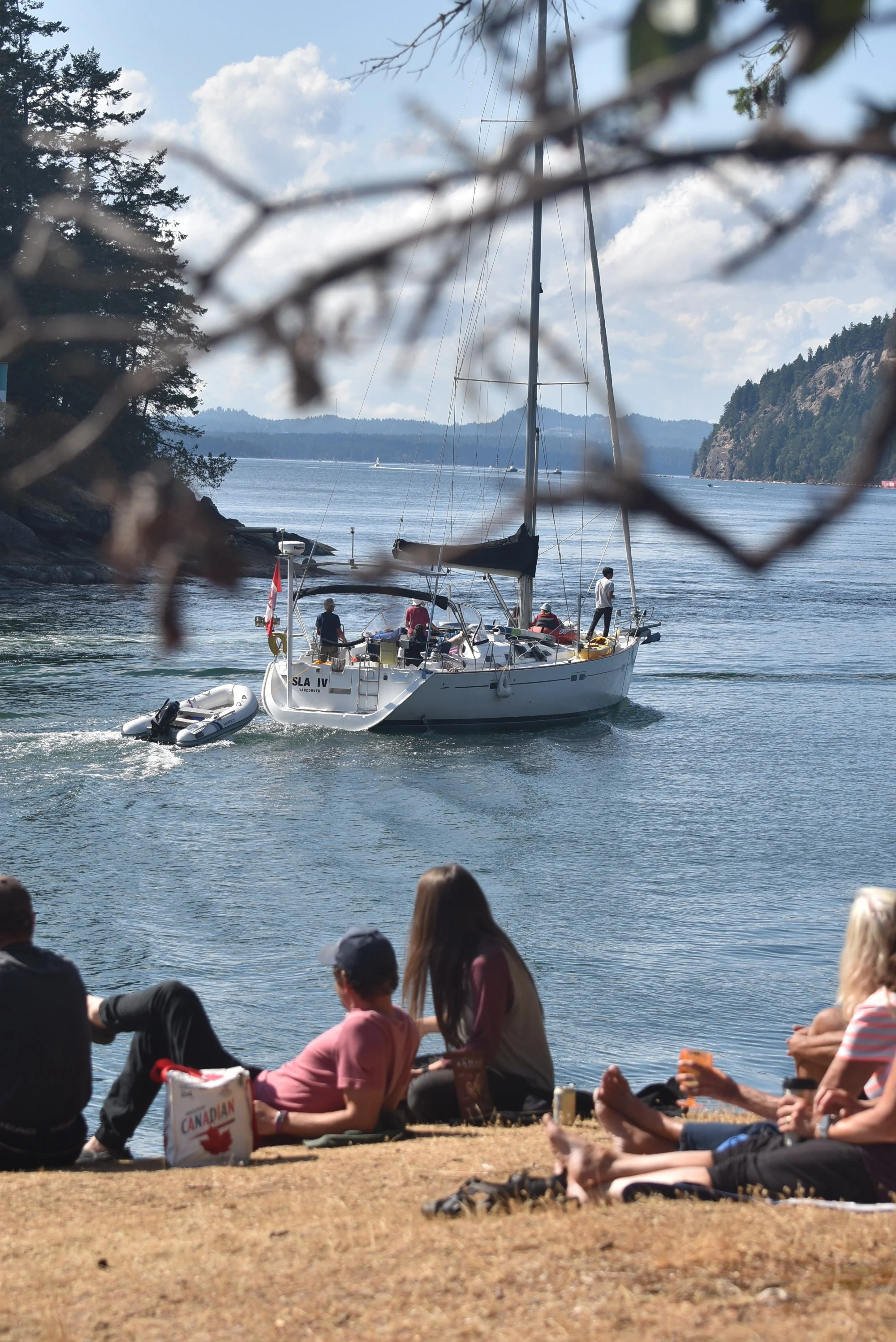 sailboat crossing Dodd Narrows, Mudge Island, BC