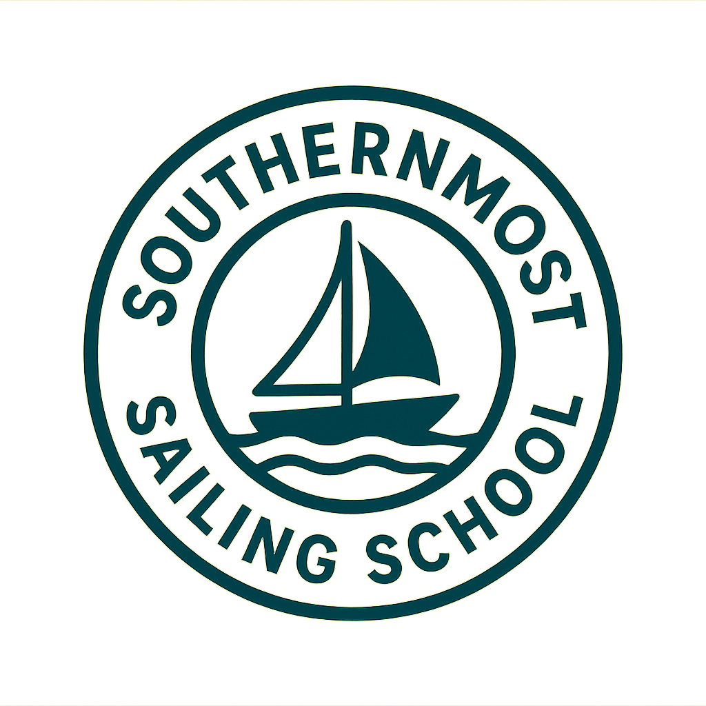 Seal of the Southern Most Sailing School with a sailboat icon in the center.