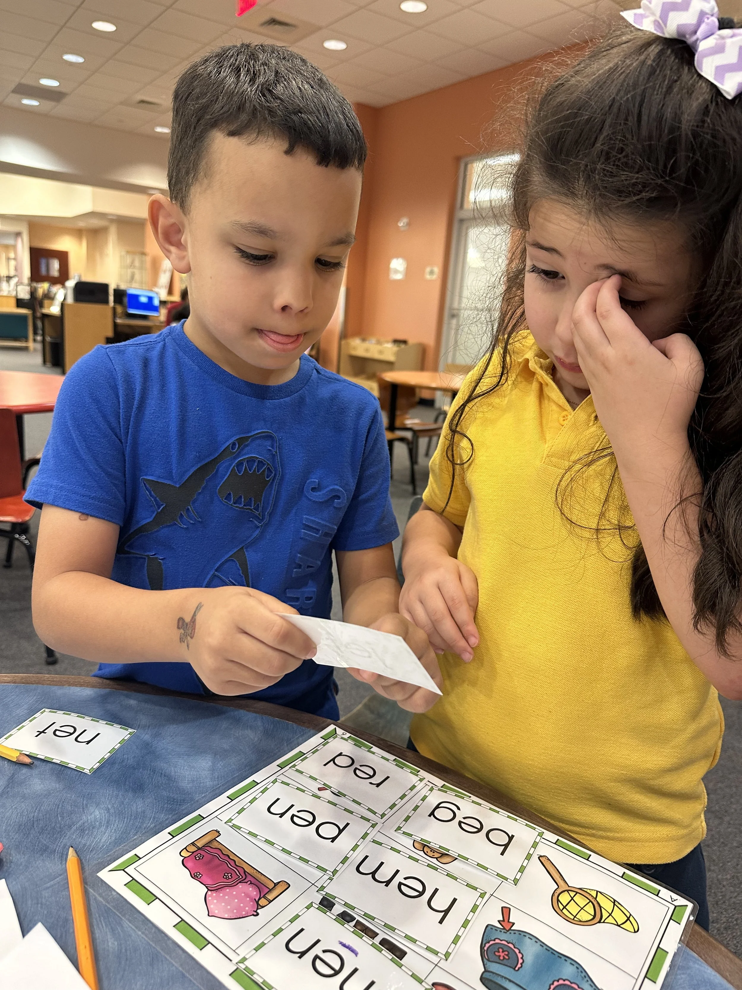students are taking place in Duluc's Learning center study bunch homework club.