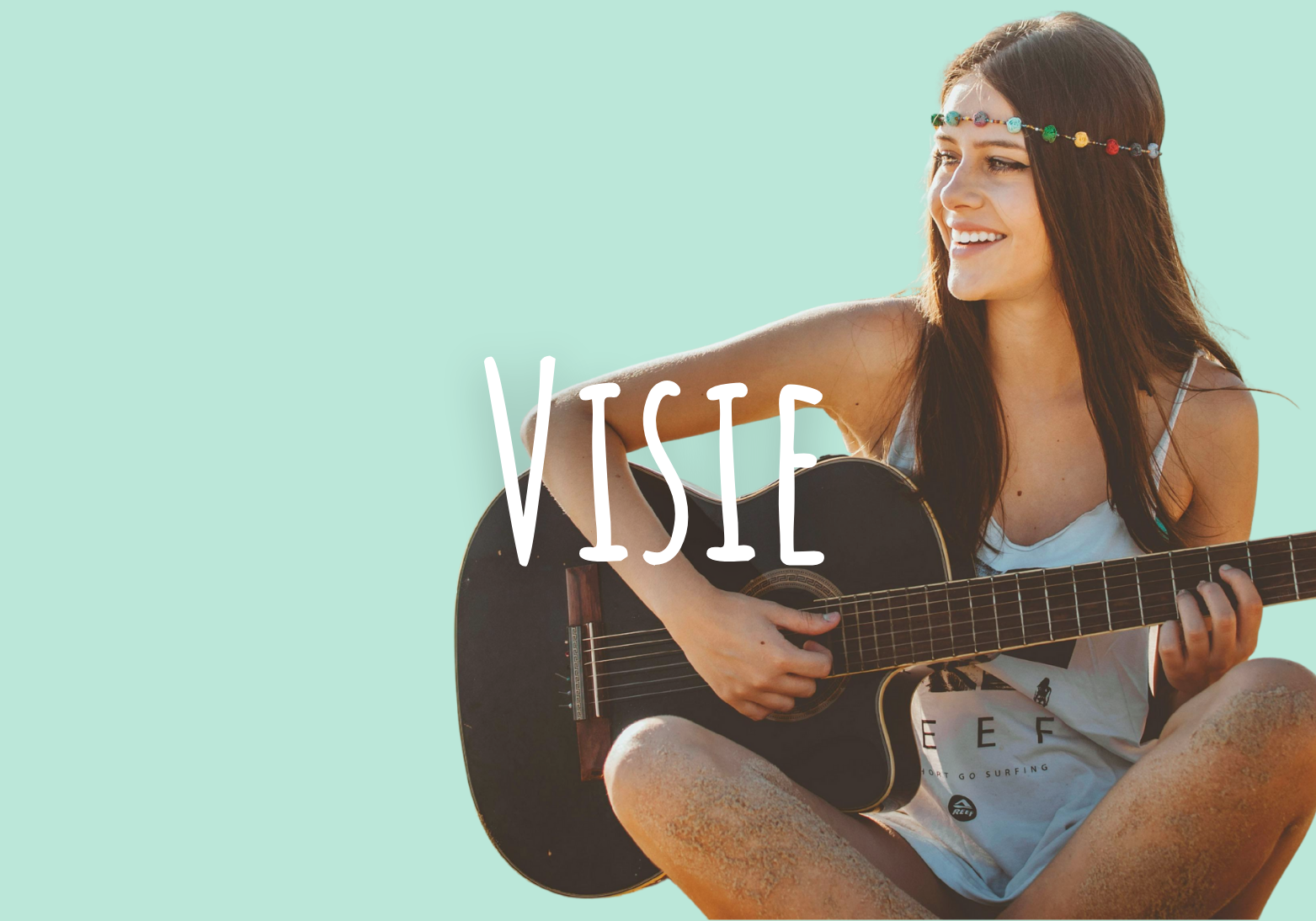 Young woman sitting with sandy legs, smiling, wearing a beaded headband, playing a black acoustic guitar against a light turquoise background with the word 'VIVIE' overlayed.