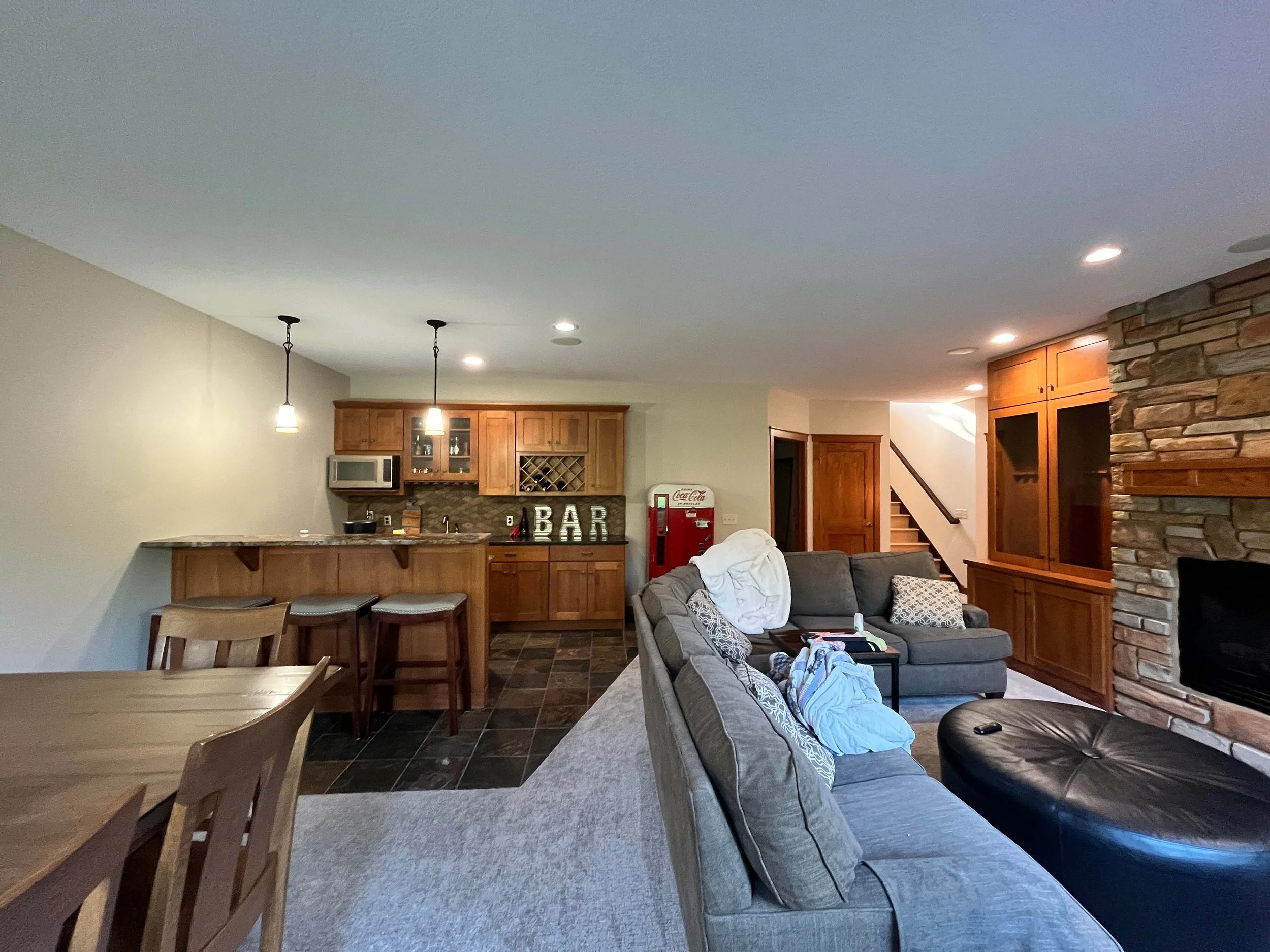 Full-scale interior painting of a large residential living area, highlighting seamless transitions and professional finishes.