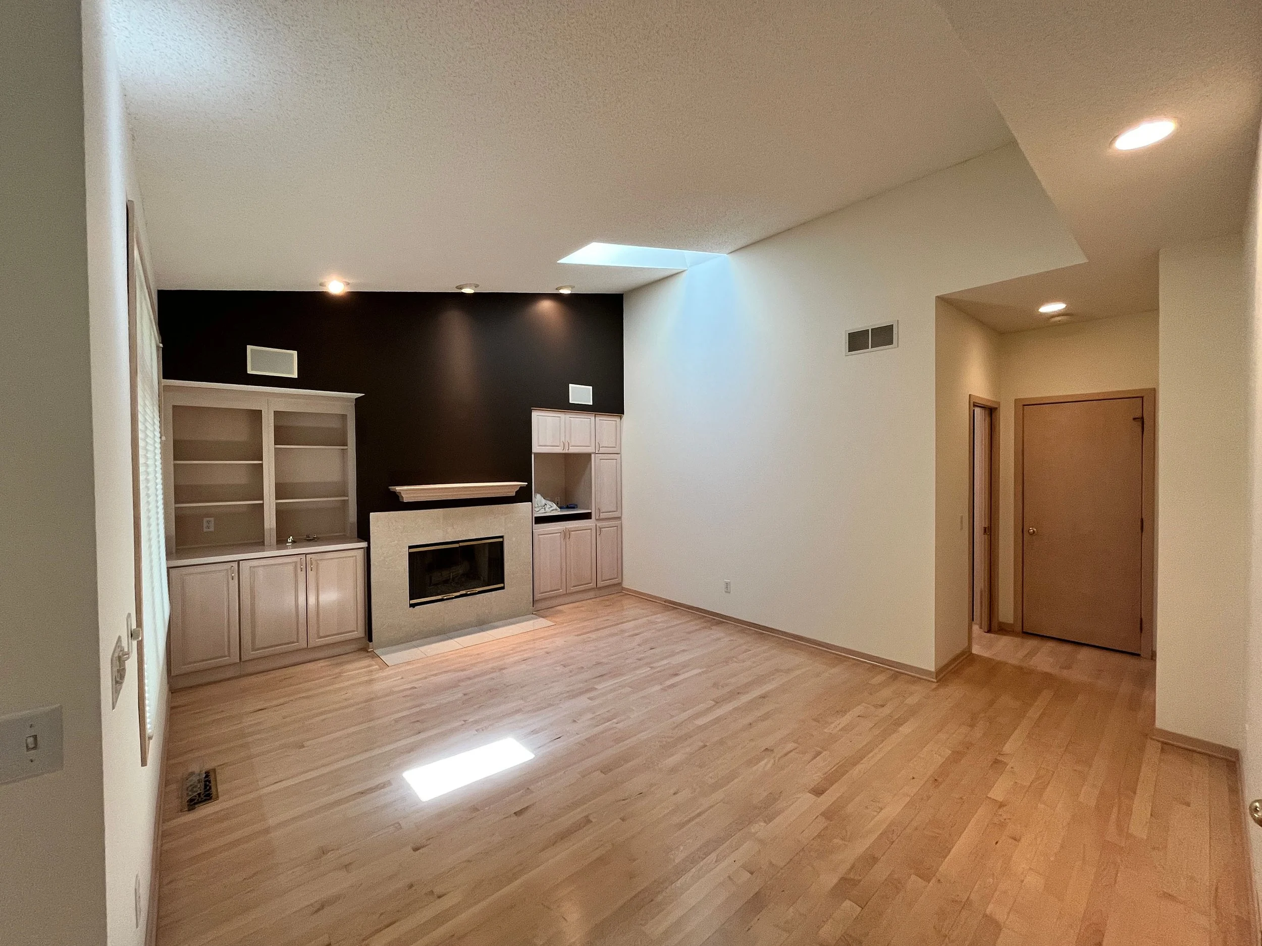 A comprehensive kitchen transformation featuring professionally painted cabinetry and updated custom wall finishes.