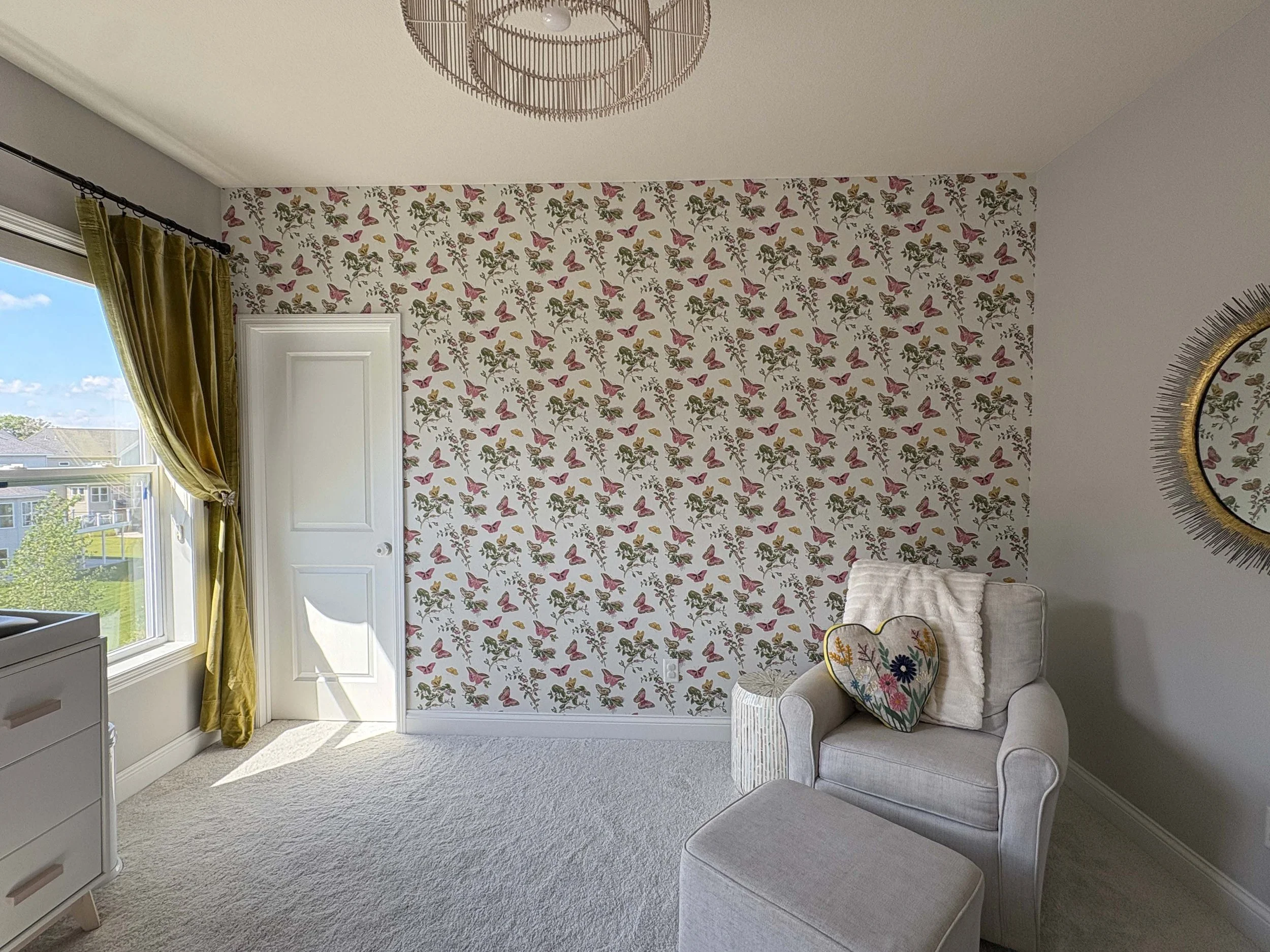 Bold, playful accent wall featuring a high-contrast pattern applied by a professional wallpaper installer.