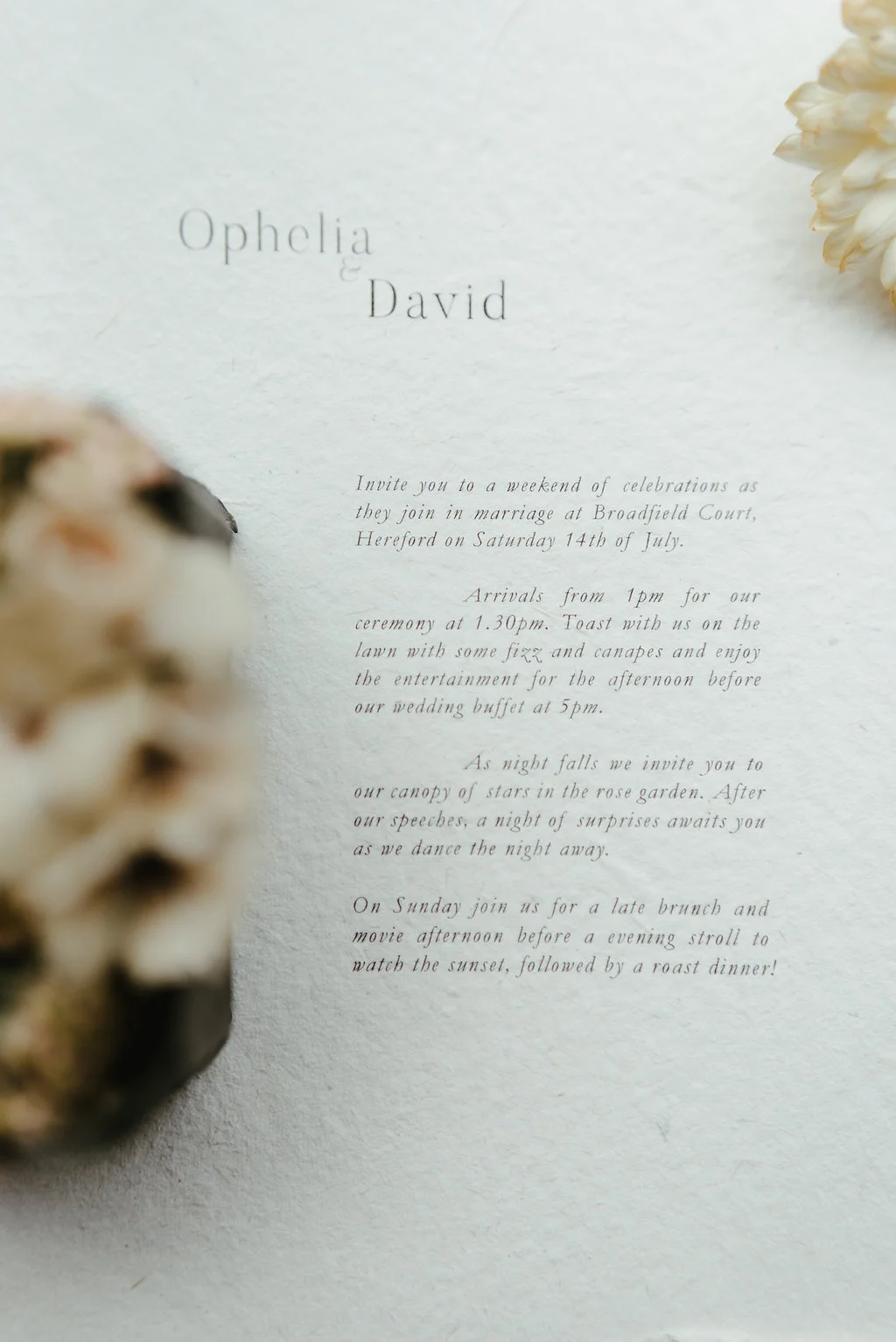 Wedding invitation for Ophelia and David with details of the celebration and schedule.