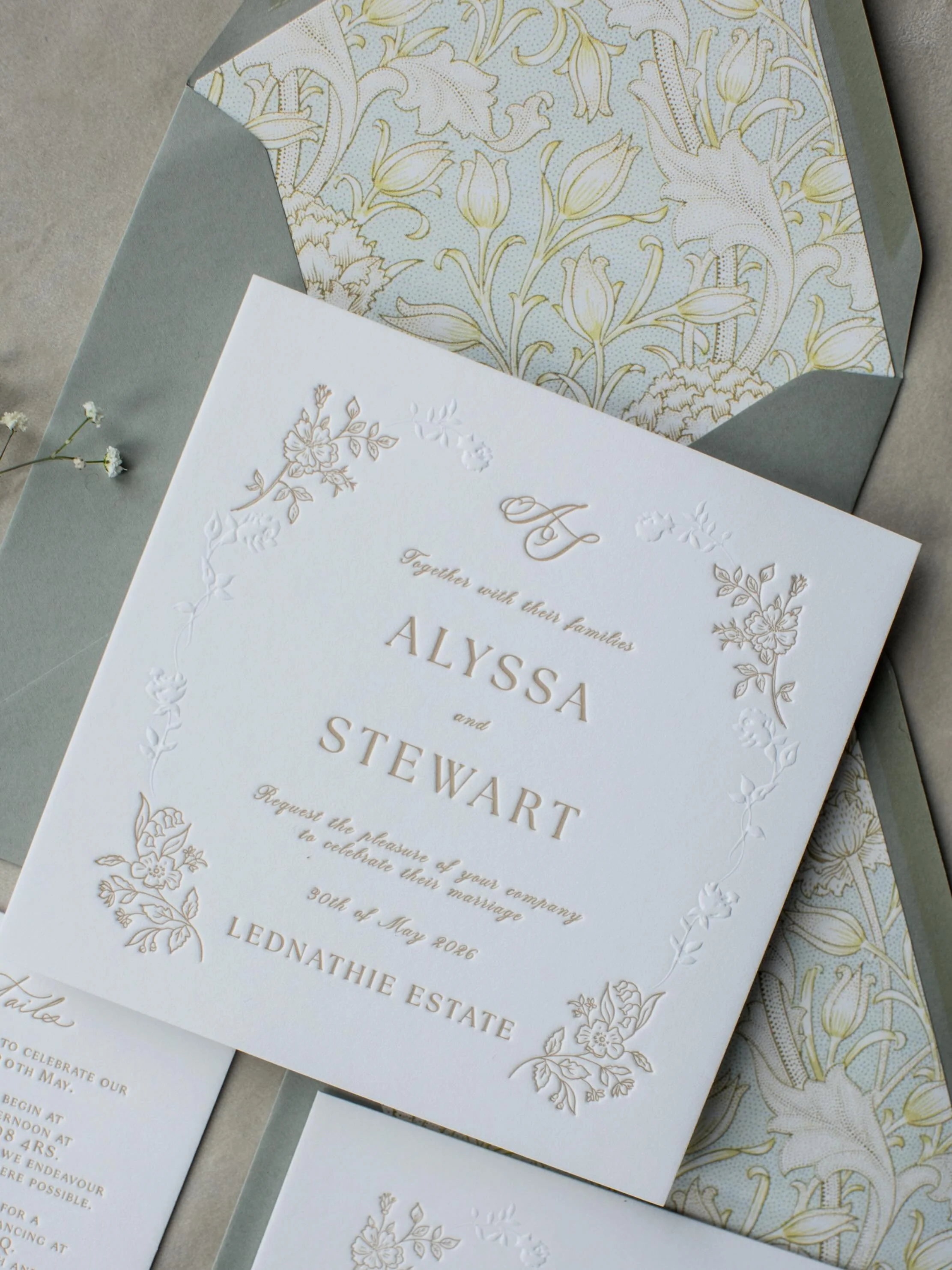 Soft taupe letterpress and understated embossed detailing echoed the bride&rsquo;s parents&rsquo; invitations, incorporating the same floral-inspired forms as a beautiful connection between generations.
#finerartstationery #stationerydesigner #letter