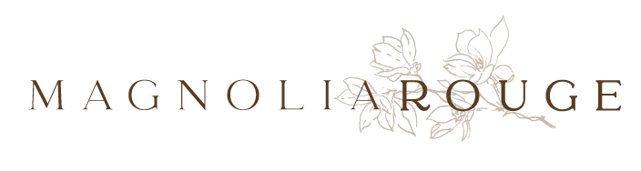 Magnolia Rouge logo with a floral illustration of magnolia flowers and leaves.