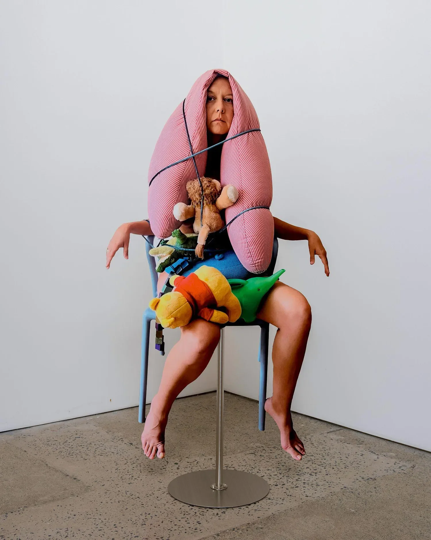 Caroline McAuliffe Caroline McAuliffe is an interdisciplinary artist and educator. She blends life and art through costume and play to explore the identity-shifting experience of motherhood and its myths. Her work has appeared in group shows both nat