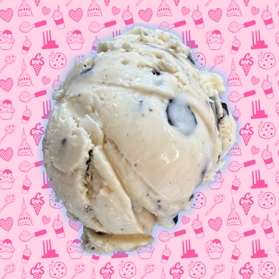 Classic cookie dough ice cream with chocolate chips mixed throughout on a pink Capital City Sweets patterned background.
