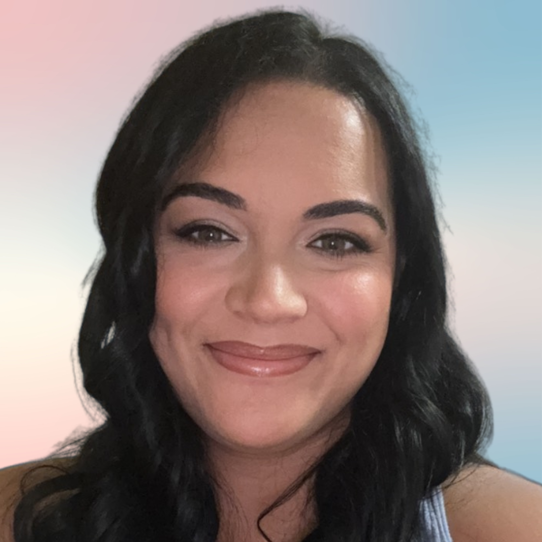 Close-up of a smiling woman with long black hair, wearing makeup, against a pastel gradient background.