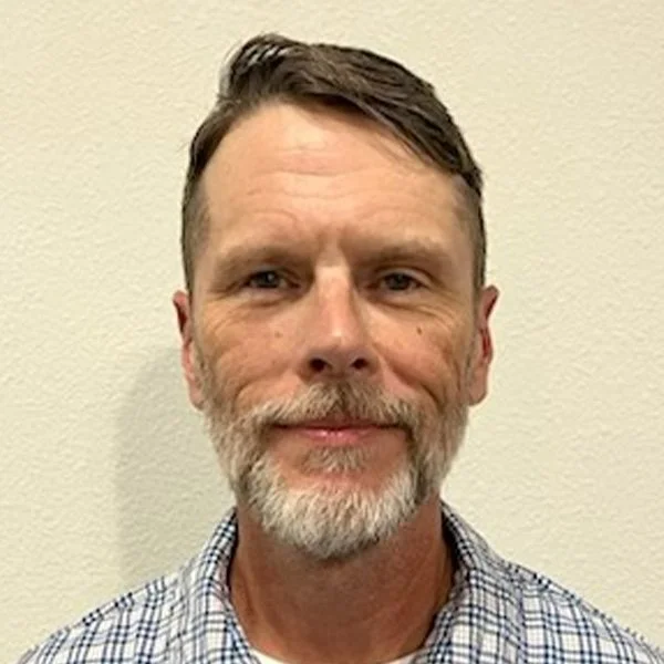 Headshot of Chris Chapman, Property Maintenance and Construction Manager for Denton Affordable Housing Corporation