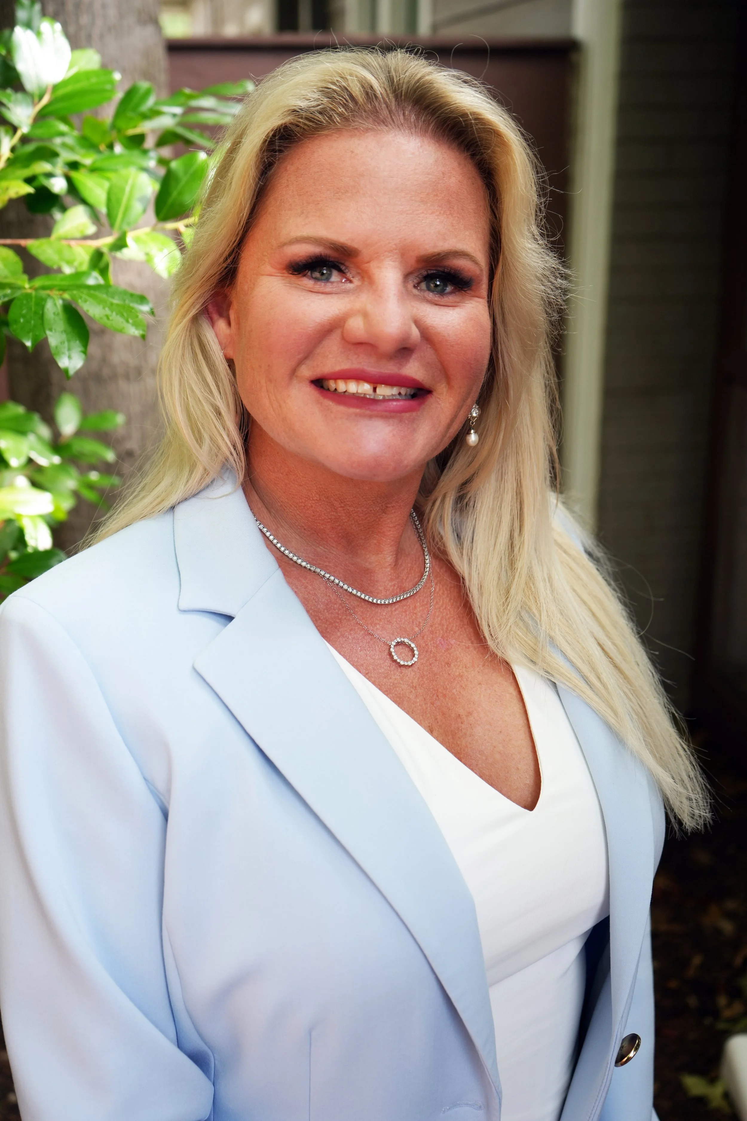 Headshot of Carrie Baugus, Executive Director of Denton Affordable Housing Corporation