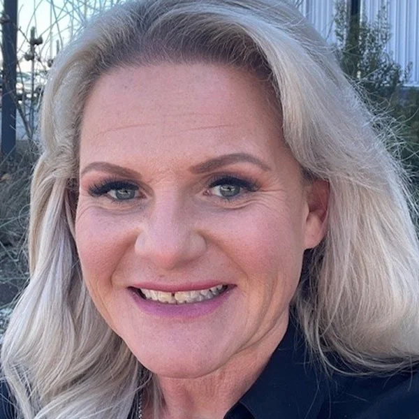 Headshot of Carrie Baugus, Executive Director of Denton Affordable Housing Corporation