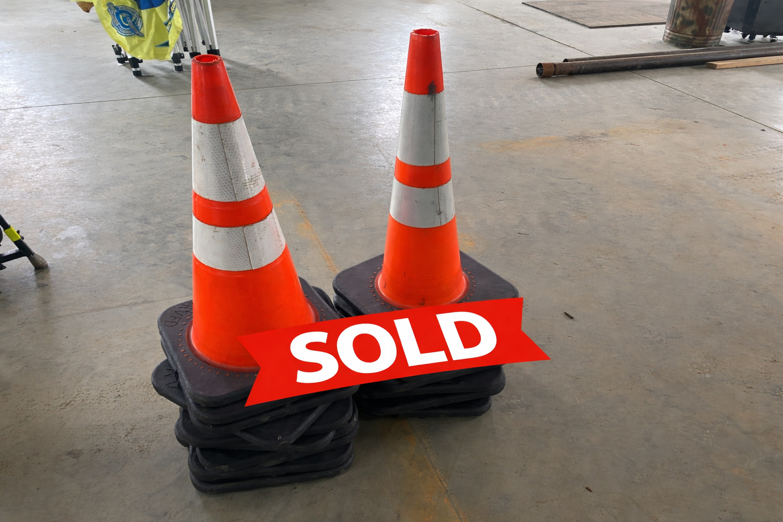 Sold orange traffic cones in warehouse.png