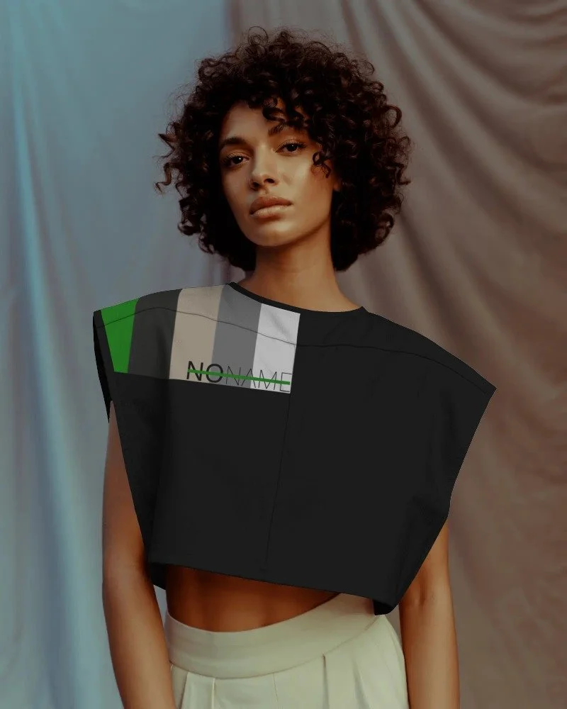 draped-backdrop-crop-top-mockup-curly-haired-model-in-boxy-top-with-soft-expression-0155.jpg