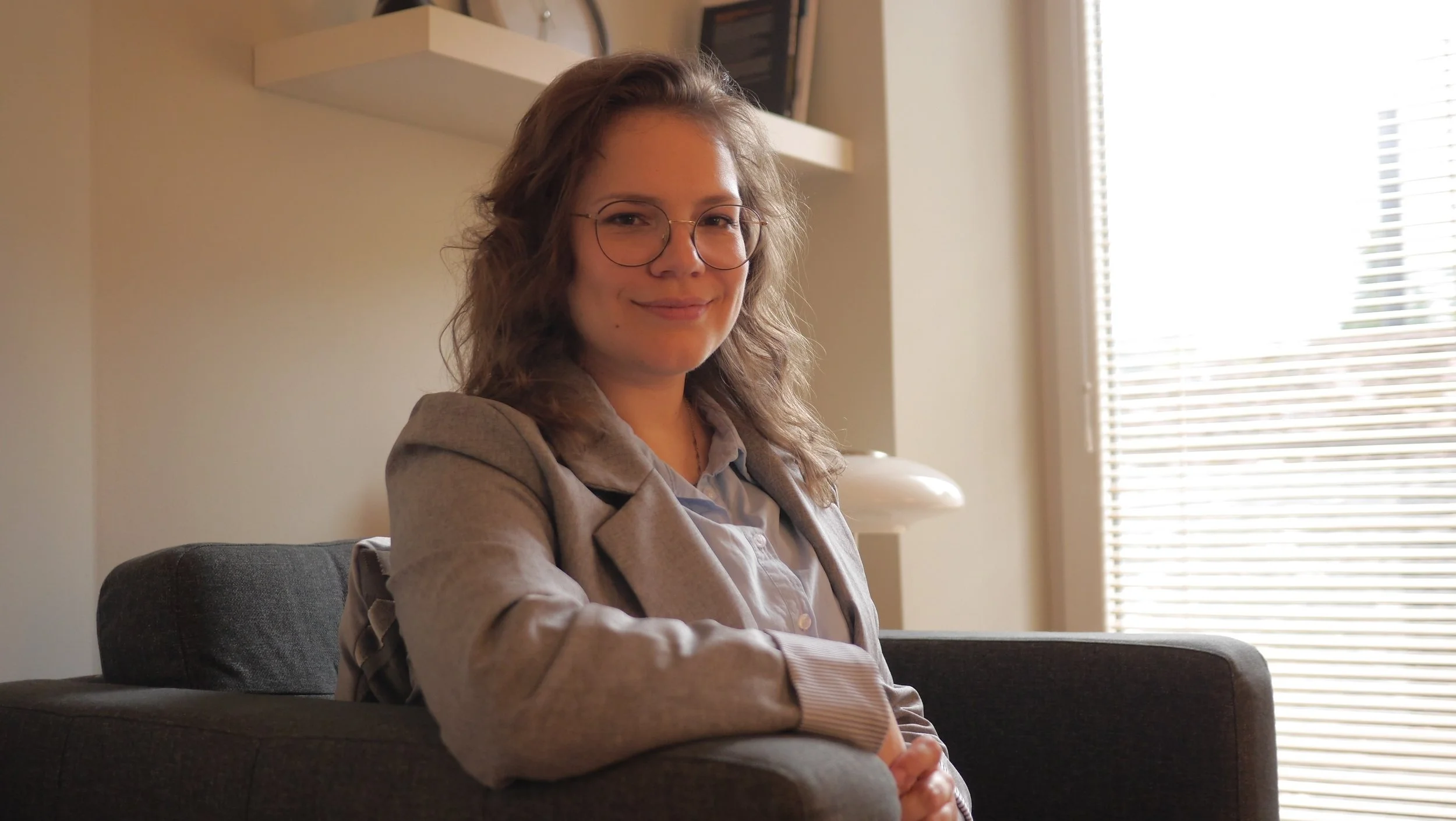 A portrait of Eva Virc - Psychotherapist providing online therapy services