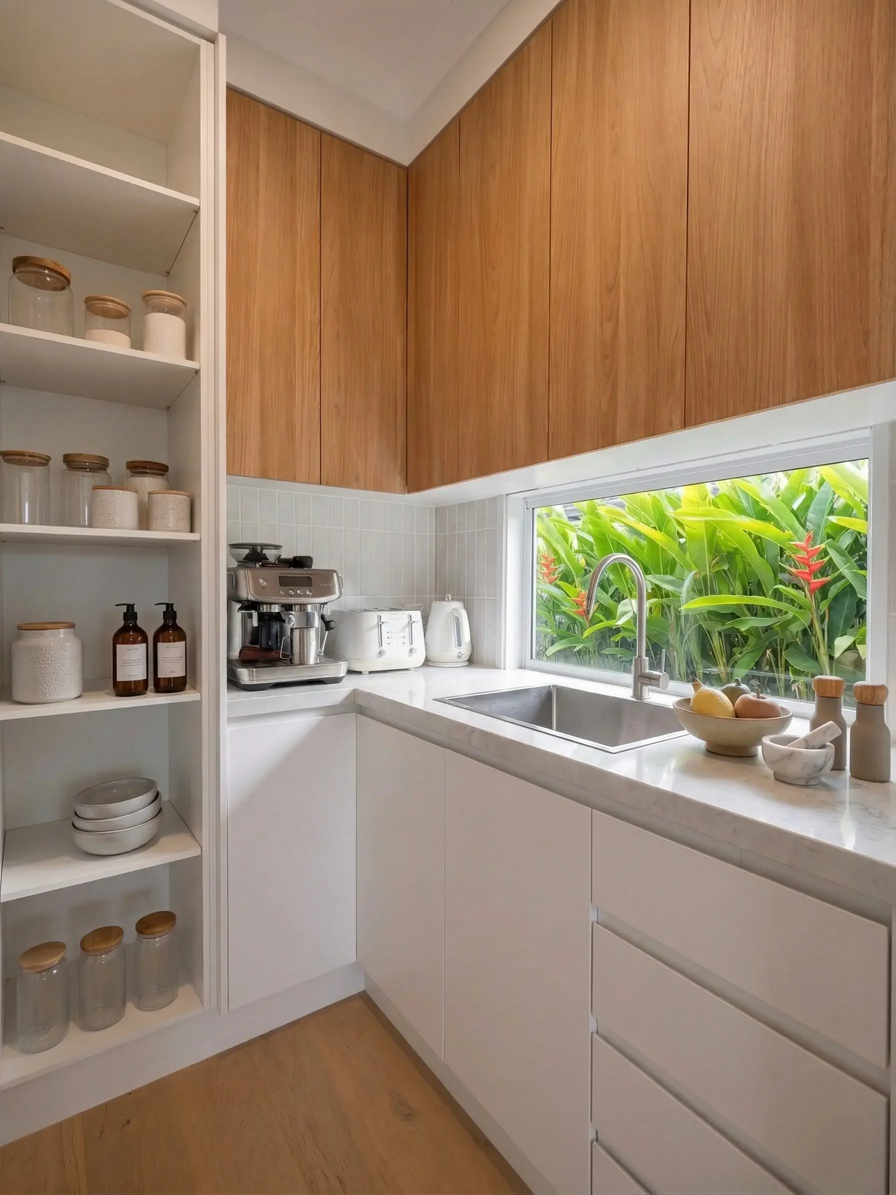 Minimalist butlers pantry / coffee nook with white floor cabinets, wooden upper cabinets, marble countertop, stainless steel sink and splashback window. Open floor-to-ceiling shelf to store pantry items in North Kellyville by TruJoinery