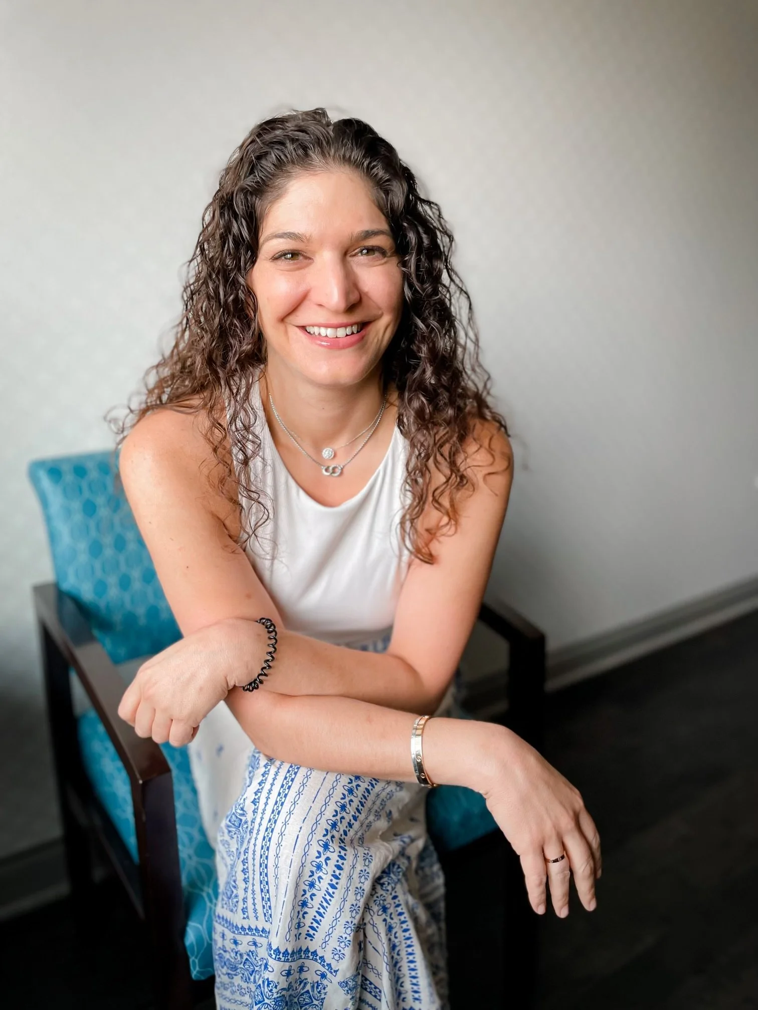 Meet Dr. Moss, board certified dermatologist and owner of Aria Dermatology & Aesthetics.