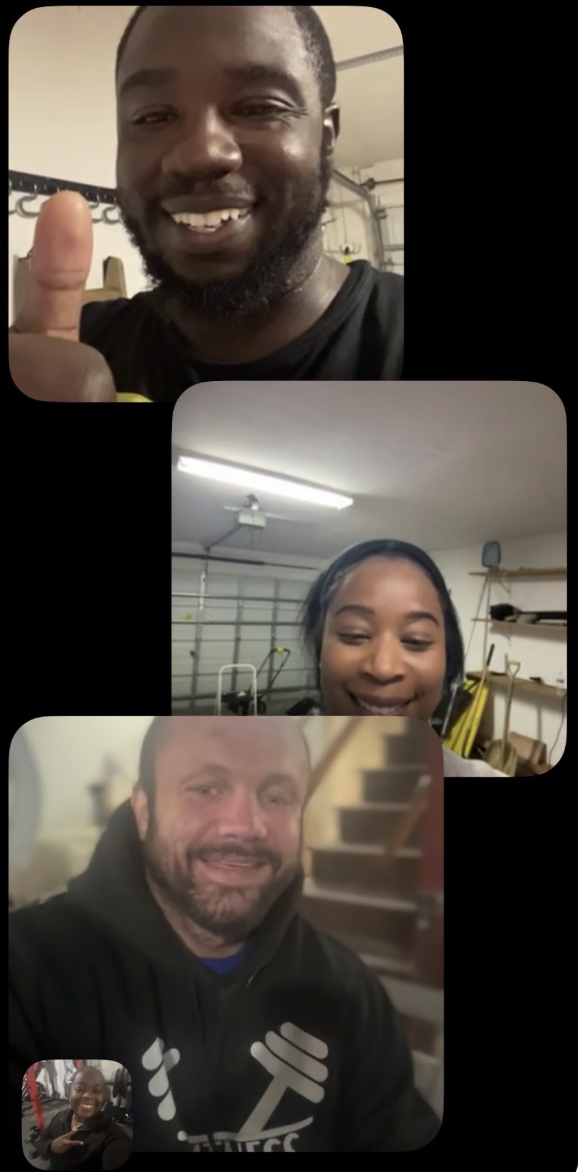 Three people taking a video call. The man at the top is smiling and giving a thumbs up. The woman in the middle is smiling in a garage with storage shelves and tools. The man at the bottom is smiling with stairs in the background, and a small inset shows another person smiling and making a peace sign.