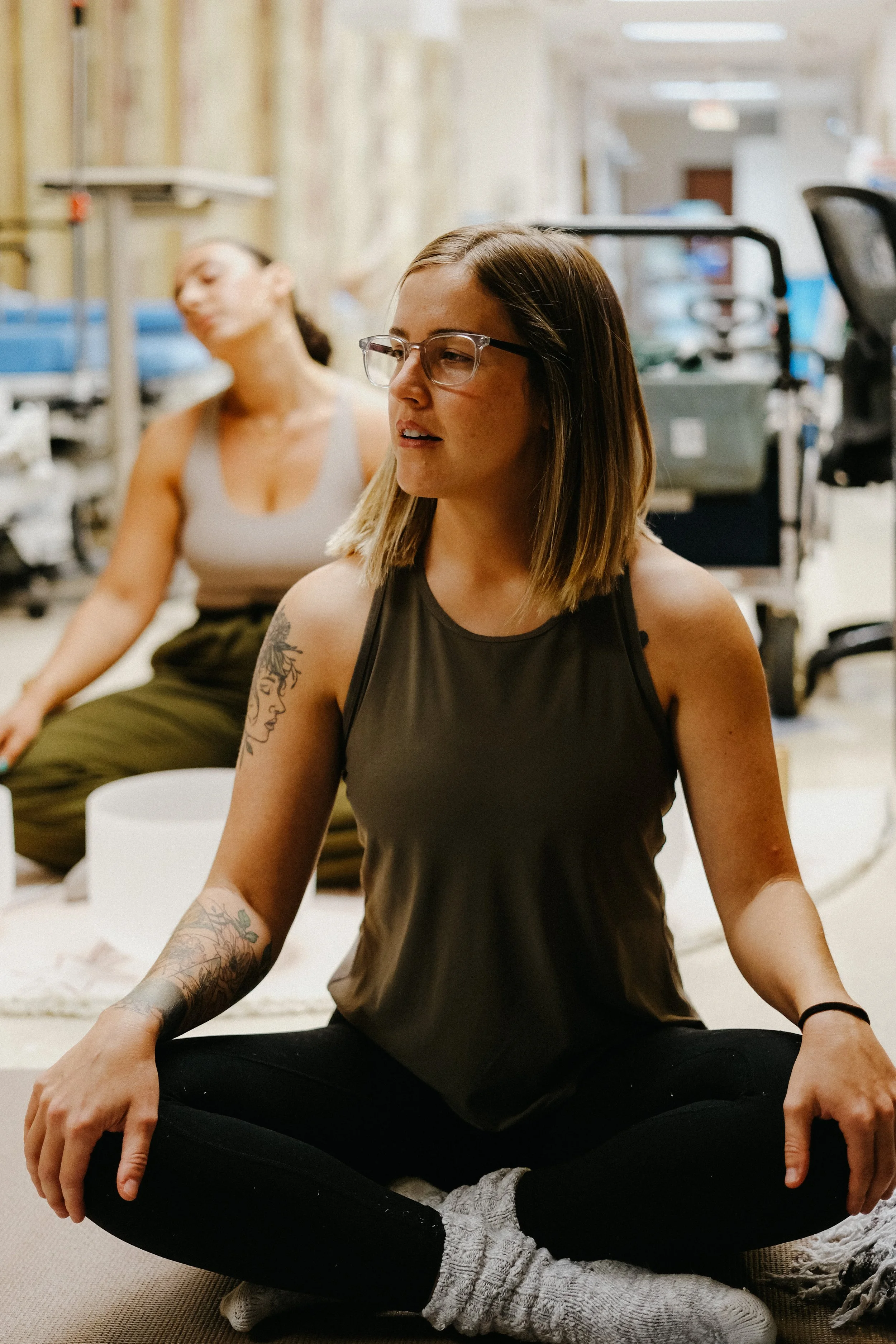 Sync'd wellness team leading Phoenix corporate yoga wellness session 