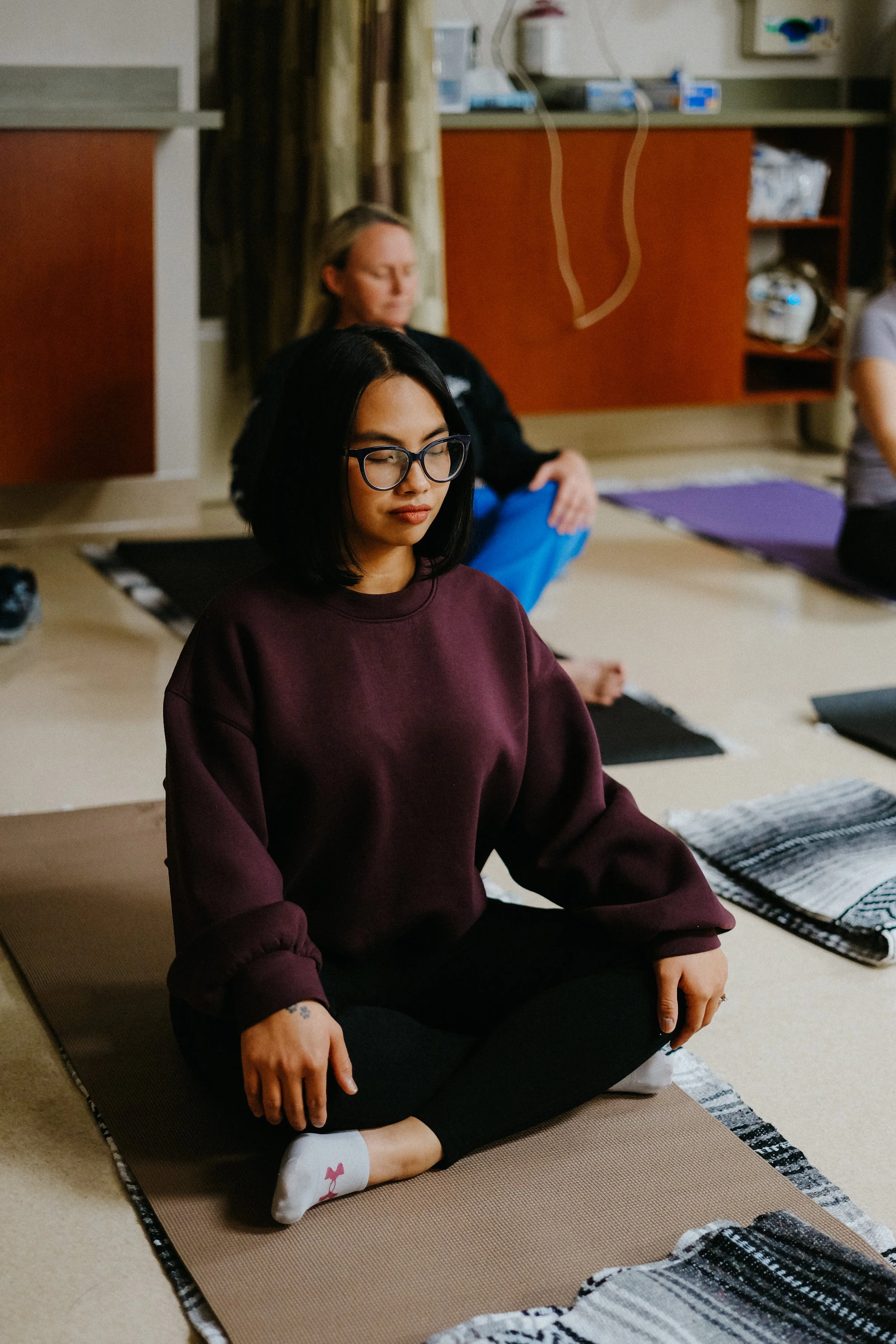Phoenix employee participating in a corporate wellness session focused on stress relief
