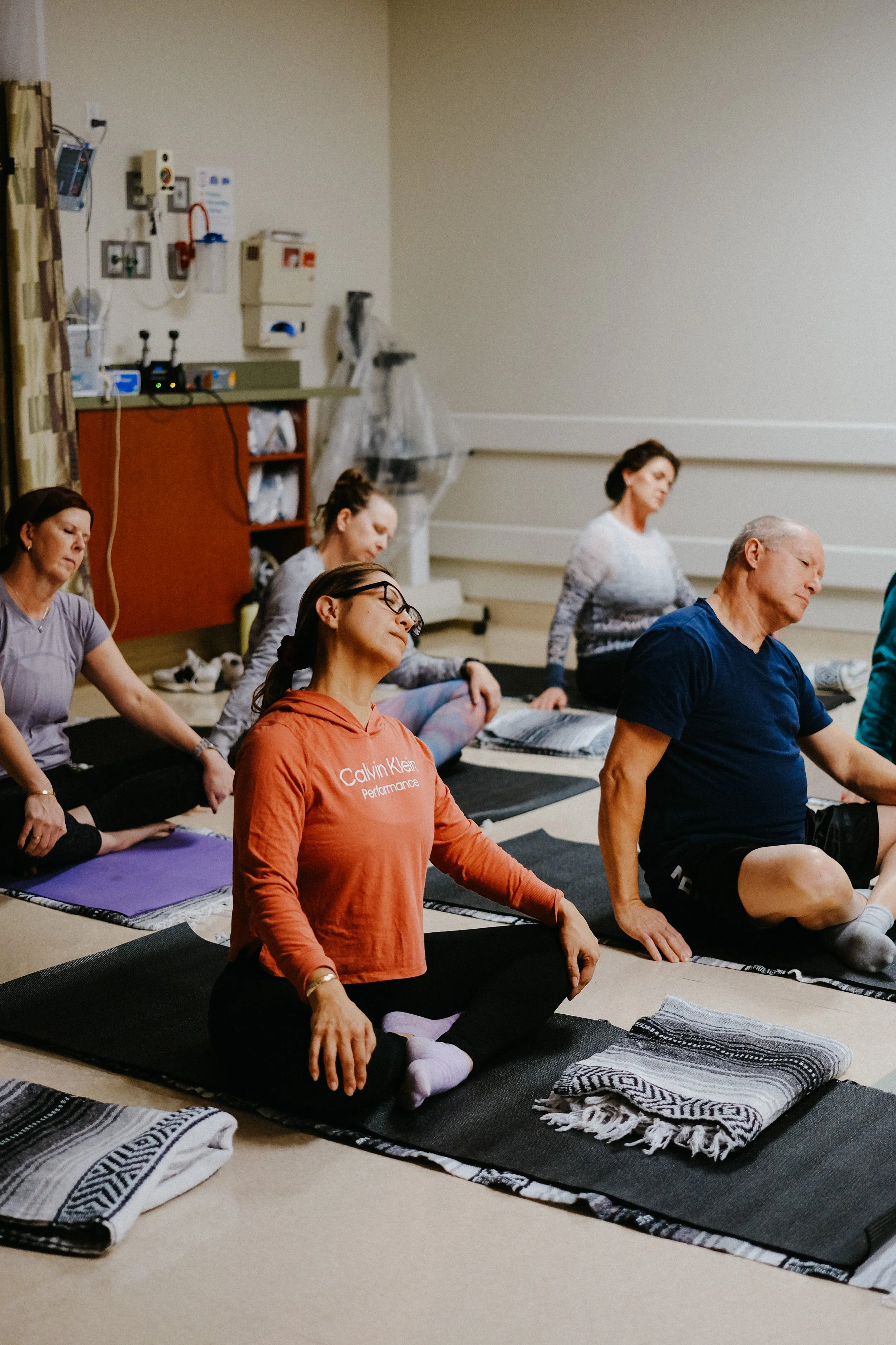 Phoenix team participating in a corporate wellness session focused on stress relief