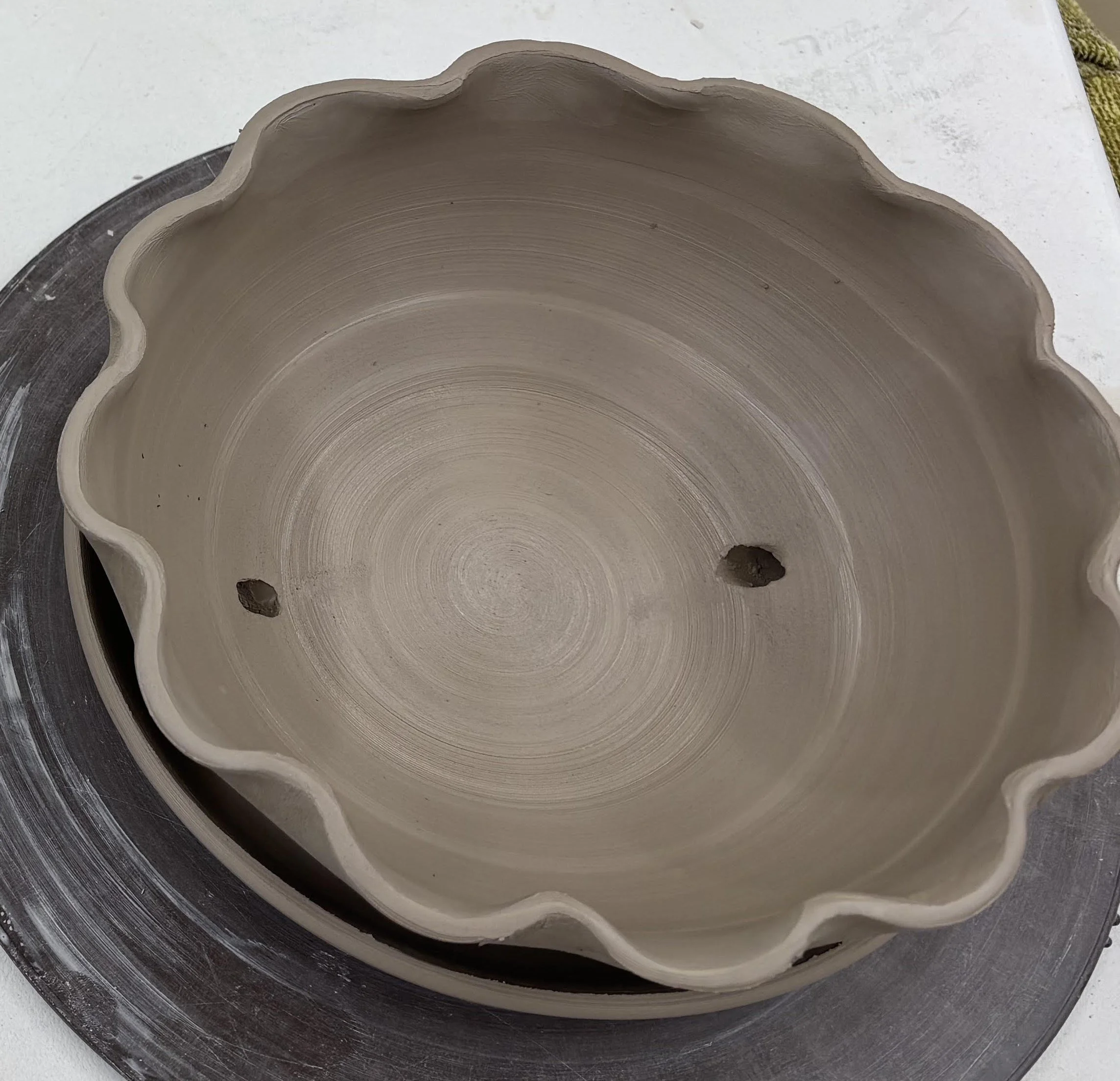 Unfired scalloped-edge 8inch, shallow flower pot.