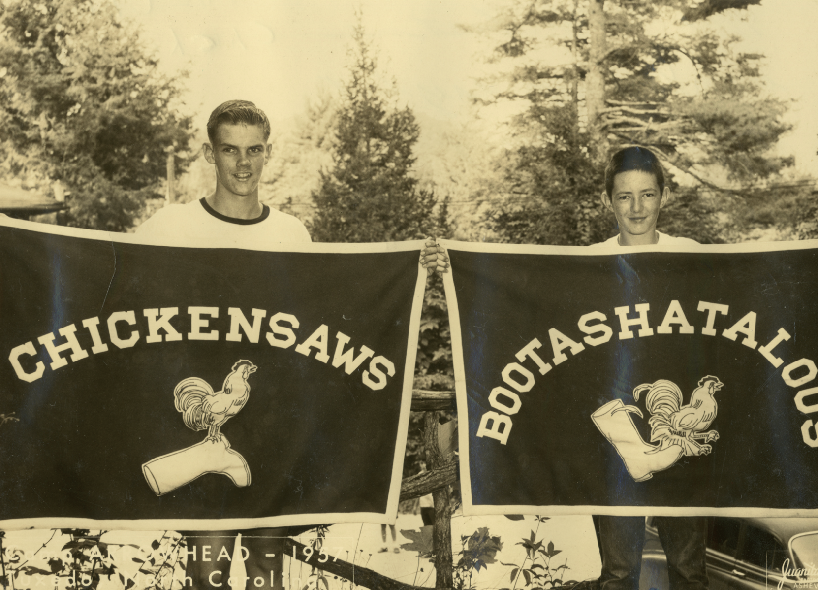    Camp Arrowhead (Tuxedo, NC) campers hold up tribal banners, c. 1950s.   