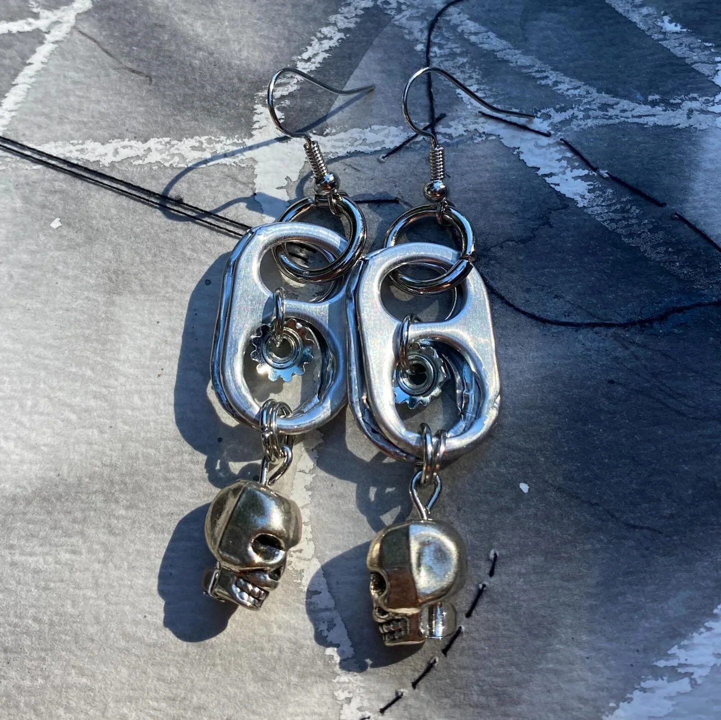 Working on some new things for the oct 18th market! Skull earrings, butterfly keychain, &amp; simple bracelet chain. &lt;3