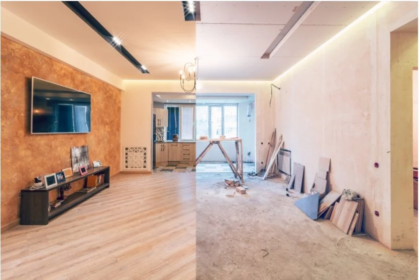 A split view of a room showing a finished living space on the left with a large wall-mounted TV, a low bookshelf with framed photos, and a chandelier, while the right side shows the same room under renovation with bare walls, construction tools, and unfinished flooring.