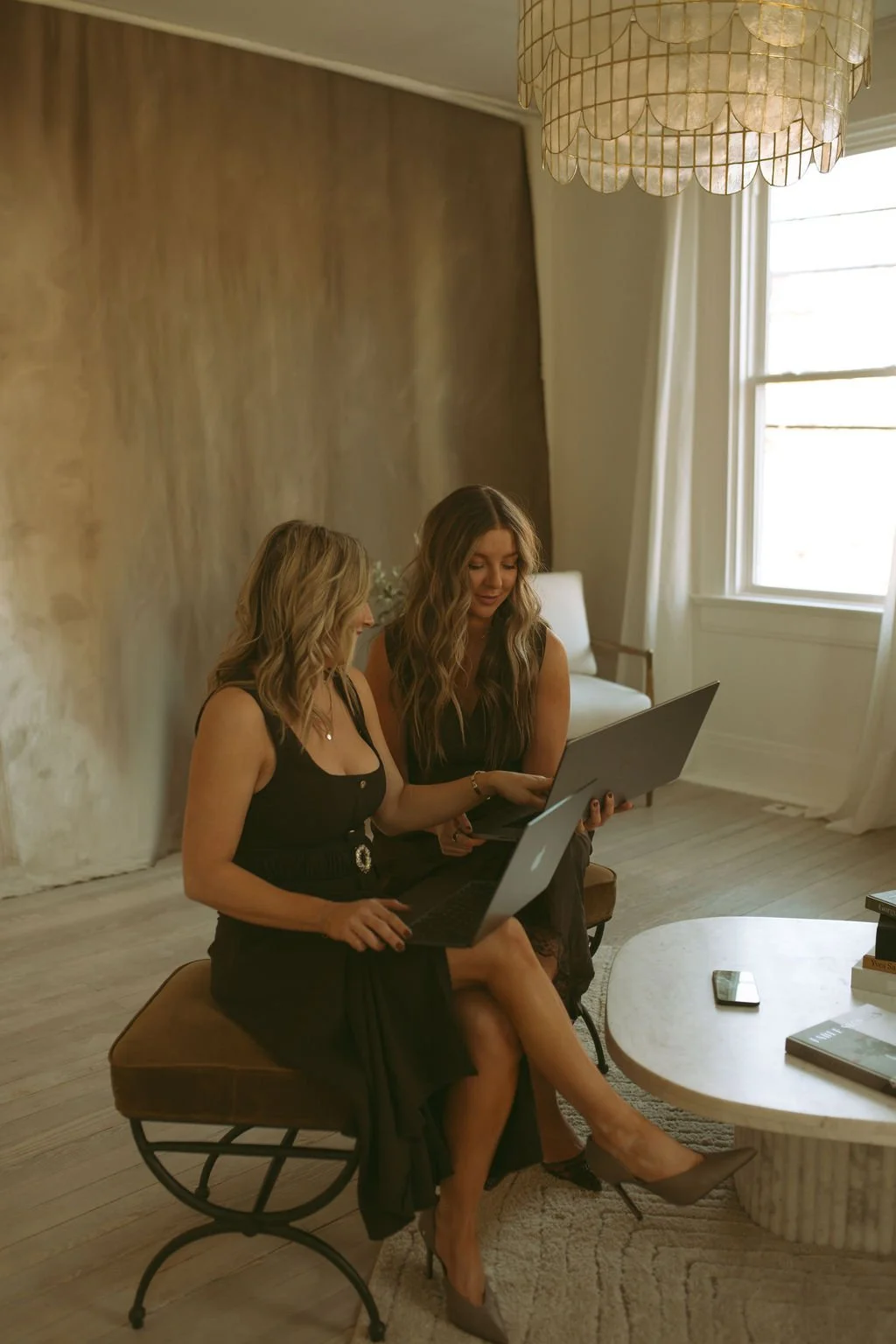 Brittany and Cameron collaborating on a project