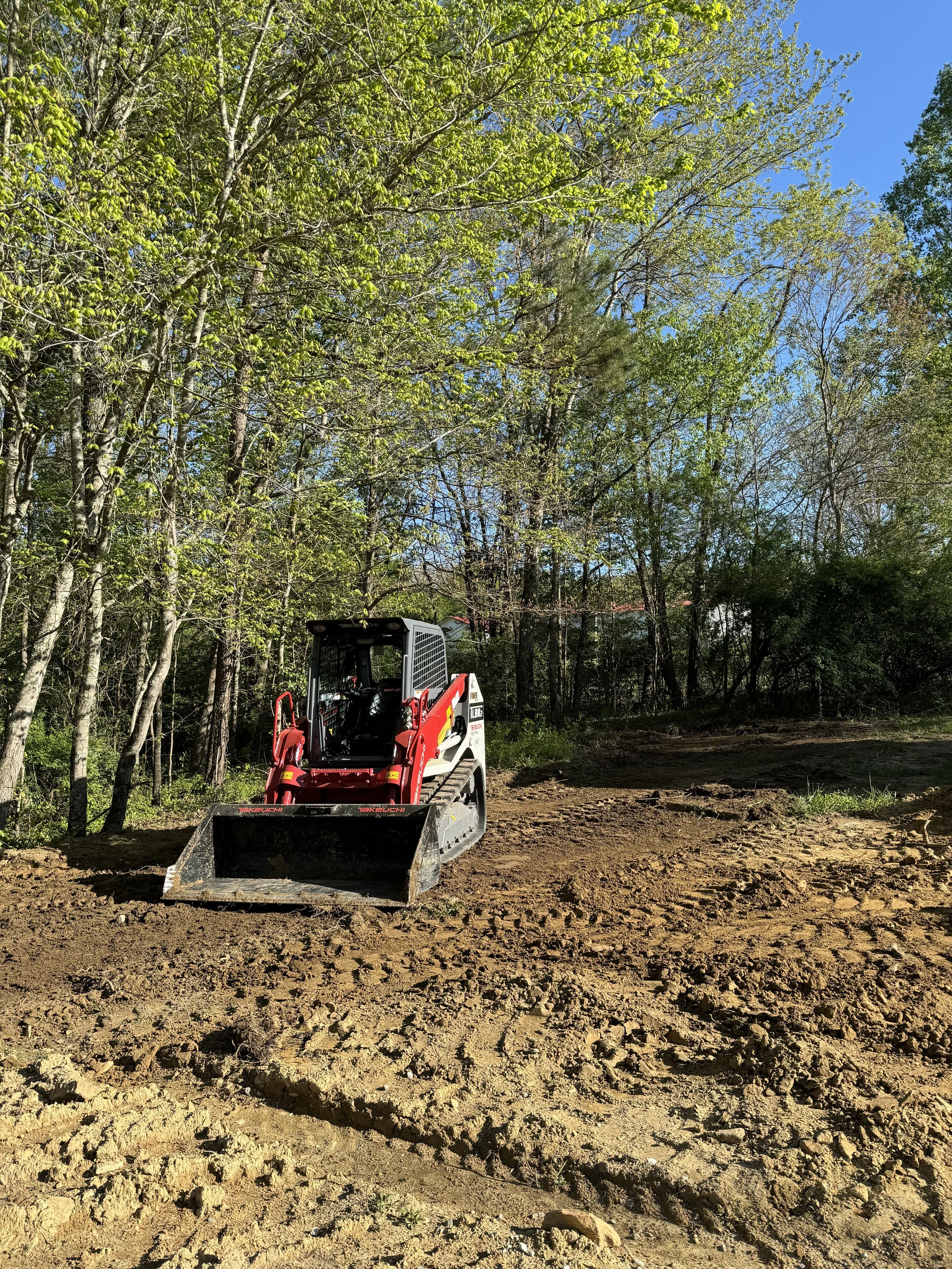  cleared and graded forest property marked for new home site 