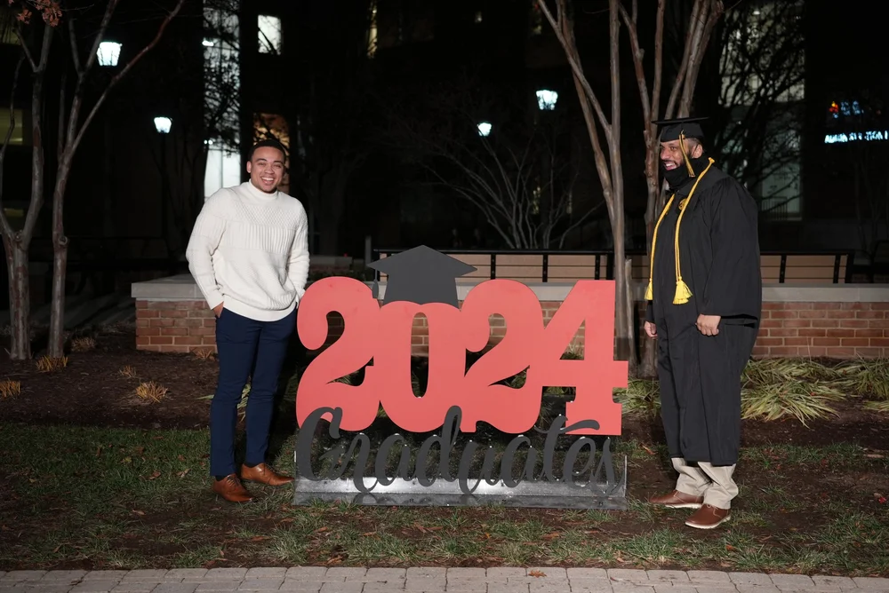 Dr. Christian Waldon and Coach Ponytail at the 2024 Graduates ceremony