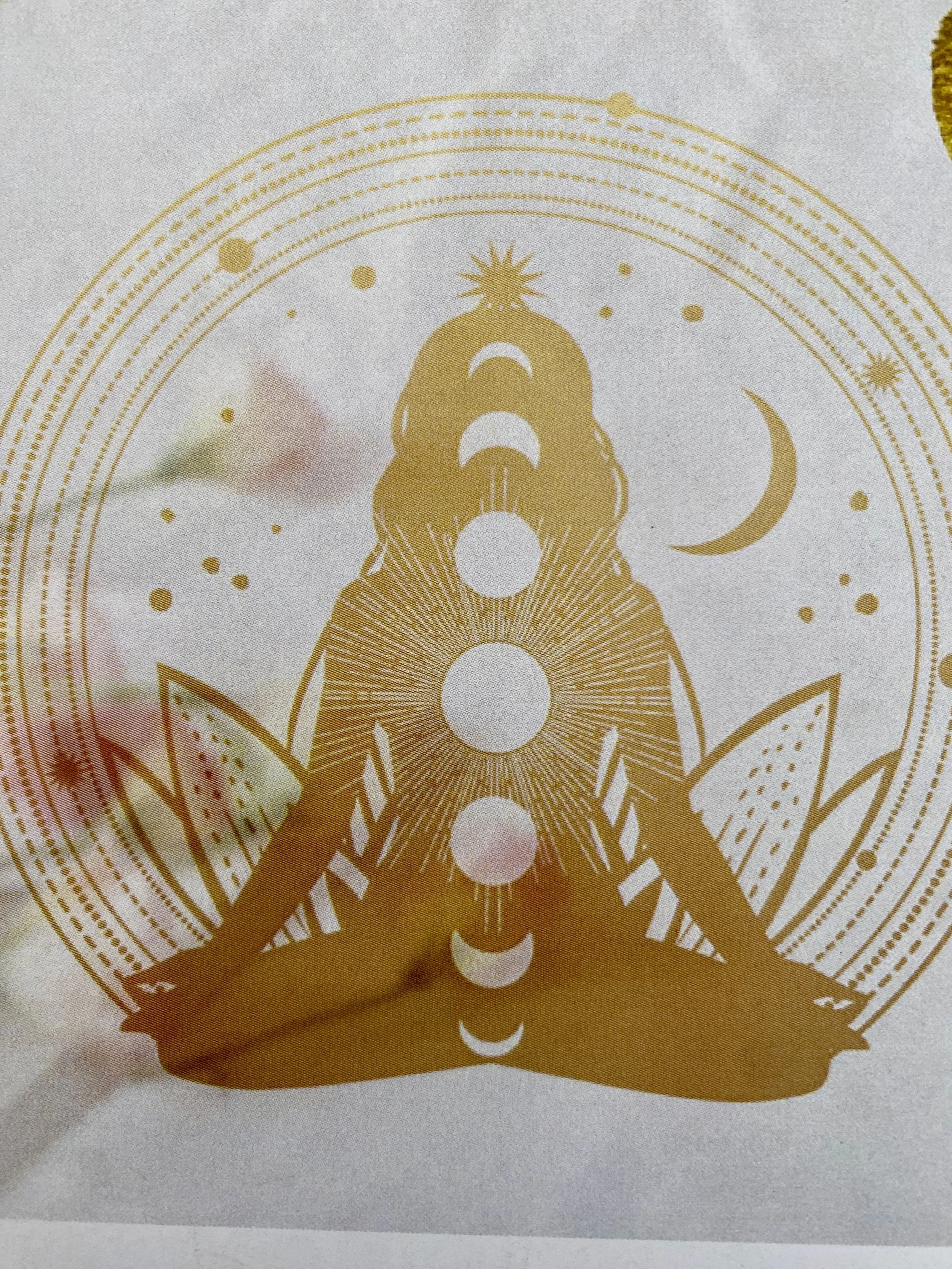 Scenic landscape of a lake surrounded by rolling hills and mountains with cloudy sky above.