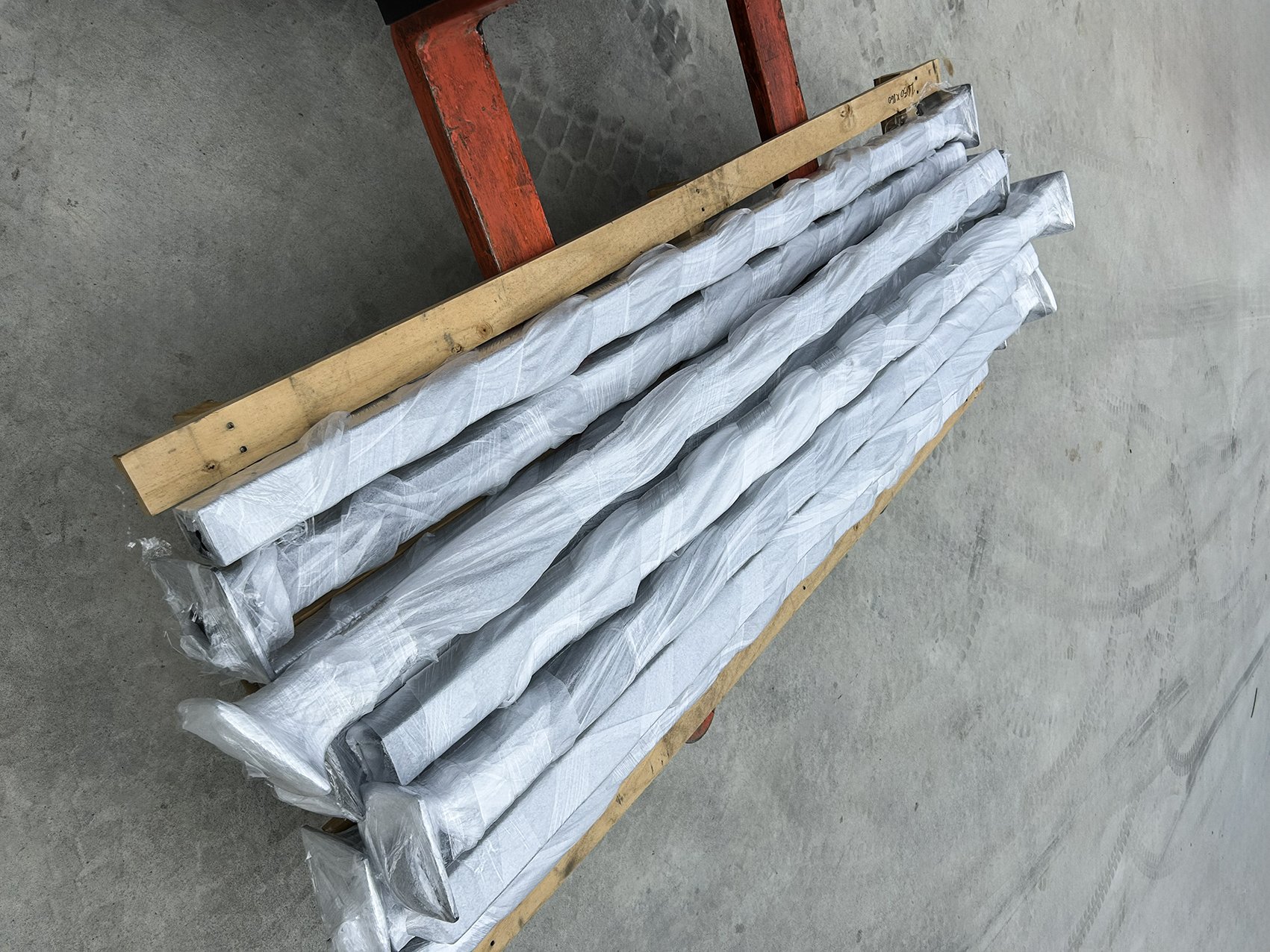 Protective wrapping of powder coated components