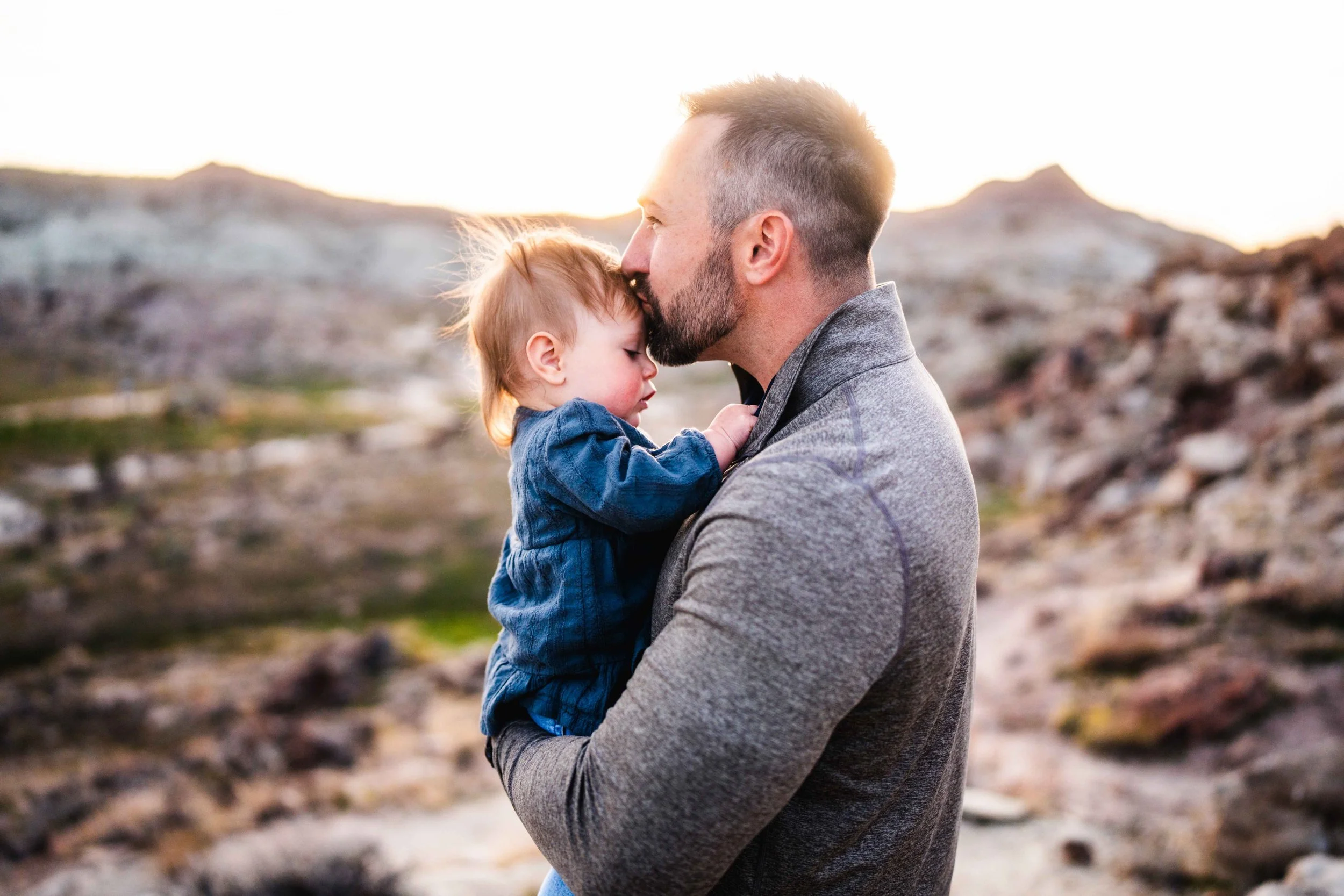 Dad and Daughter and sunset, Mcinnis Canyons.jpg