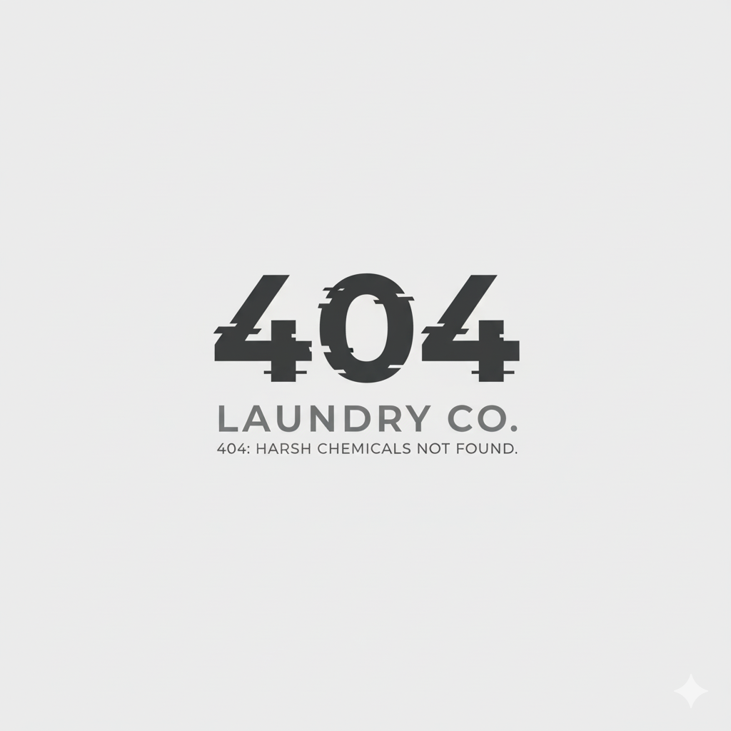 A minimalist design showing the number 404 with glitch effects, followed by the text 'Laundry Co.' and '404: Harsh chemicals not found.' underneath.