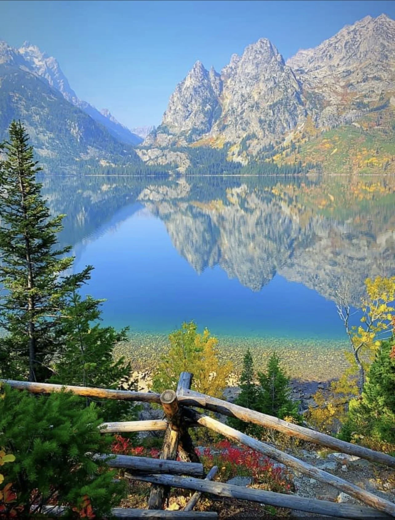 Mountains reflecting into water