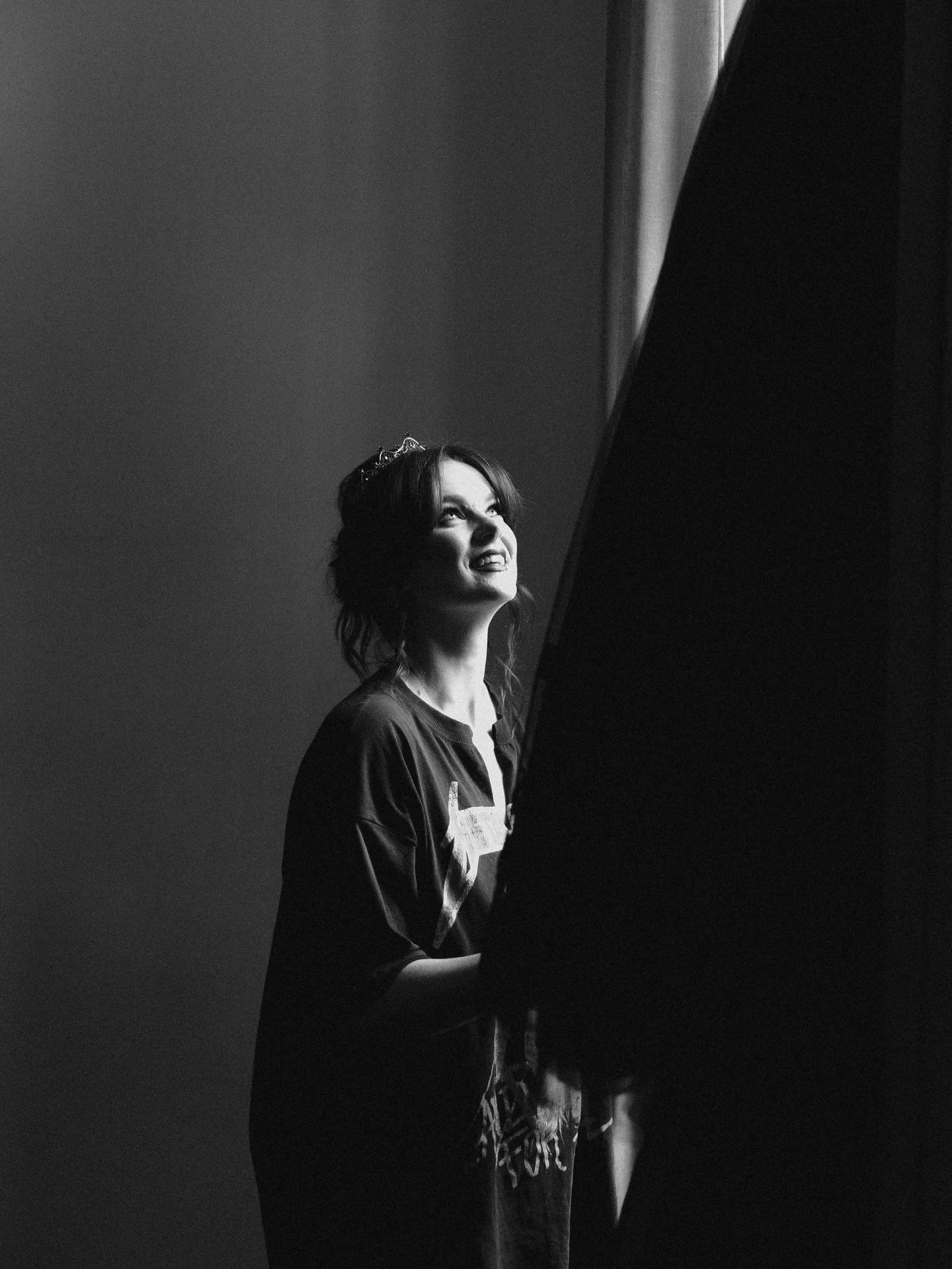 Some images are just supposed to be in black and white, and these two certainly are. 
Serena the beautiful bride in a black wedding dress and bouquet handle like a sword. 
Honestly so many awesome touches to this wedding so be prepared to see a lot m