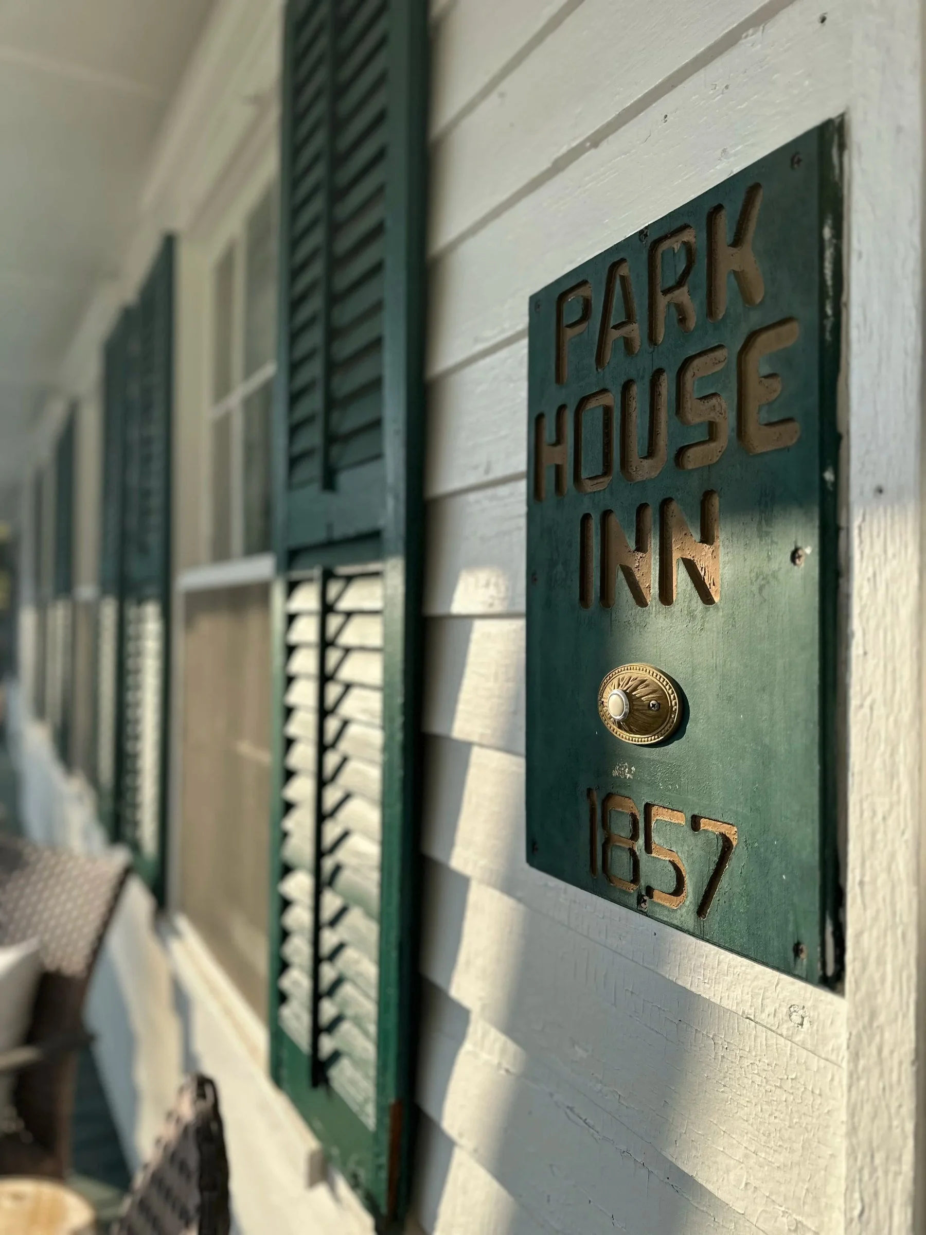 Green Park House Inn plaque dated 1857 on the white clapboard wall of the inn