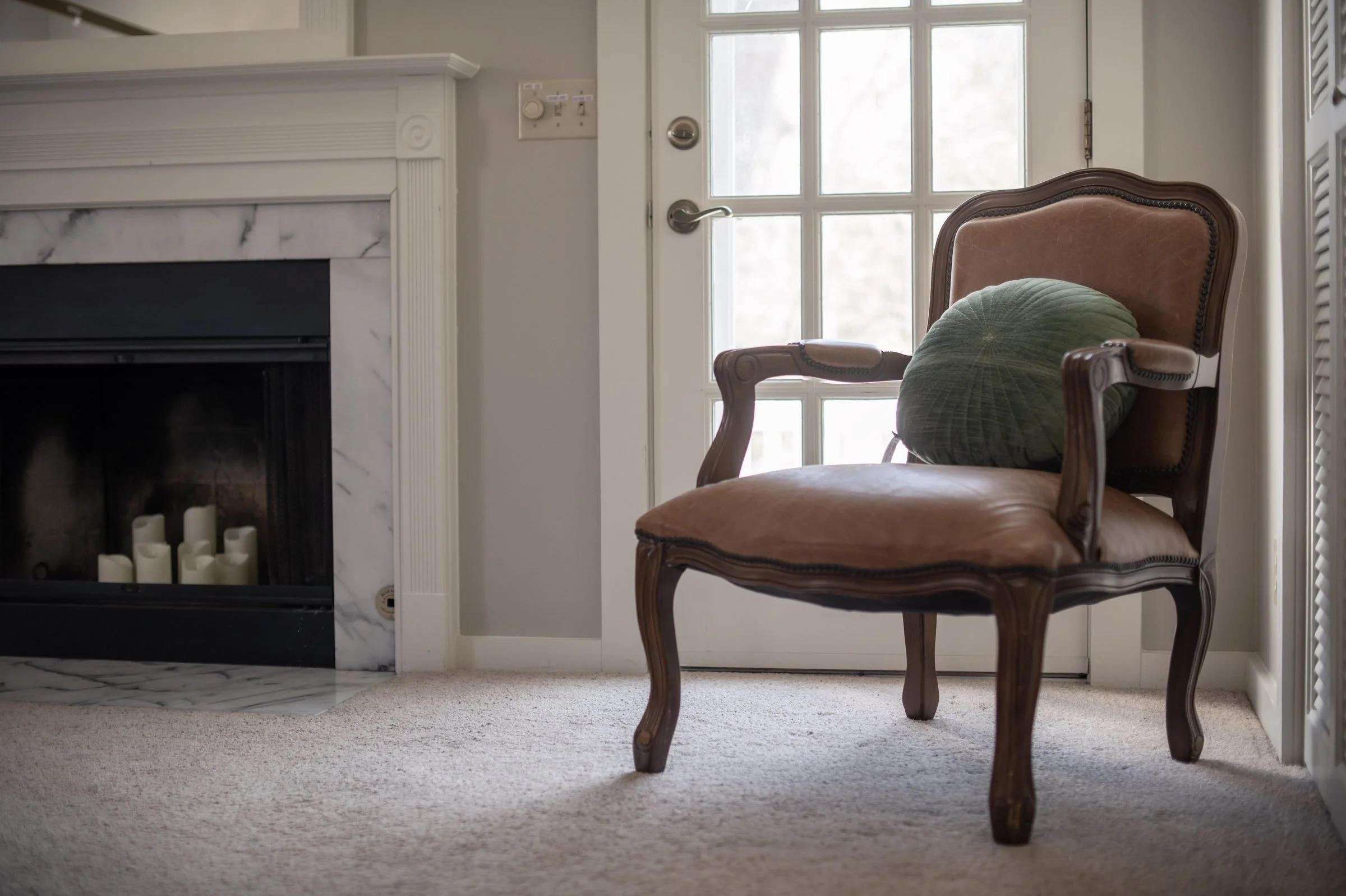 Room 8 at Park House Inn: a leather armchair beside the fireplace