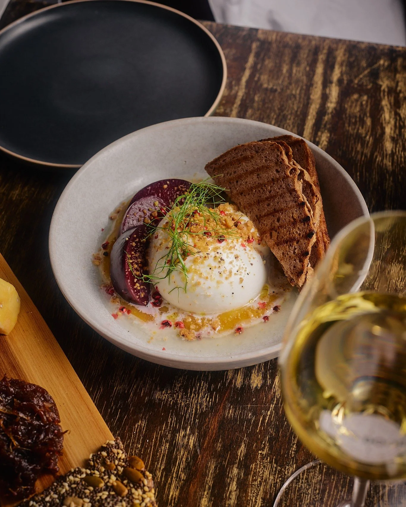 Burrata&rsquo;s back on the menu &ndash; paired with pickled plum, peach, hazelnut, and grilled bread.
Simple, fresh, and made to share.
Good way to start the night.