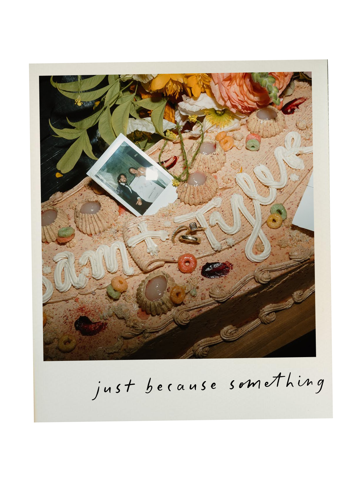 Decorative birthday cake with flowers, candies, and a photograph, featuring the word 'thank you' in icing and a handwritten note that says 'just because something'.