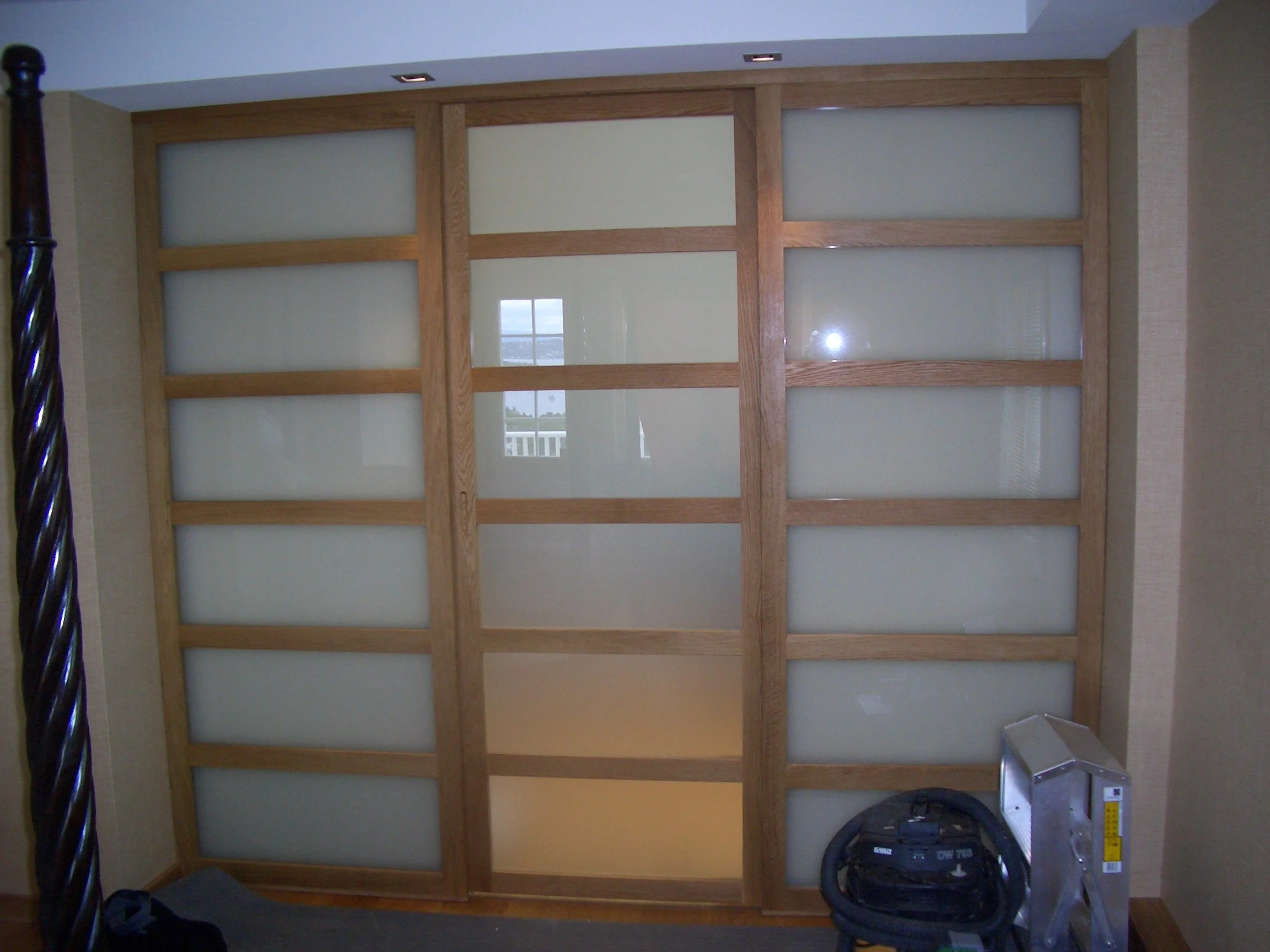 Oak frosted glass doors, Custom walk-in closet, garderobe,  made by Snekker Travis Johnson