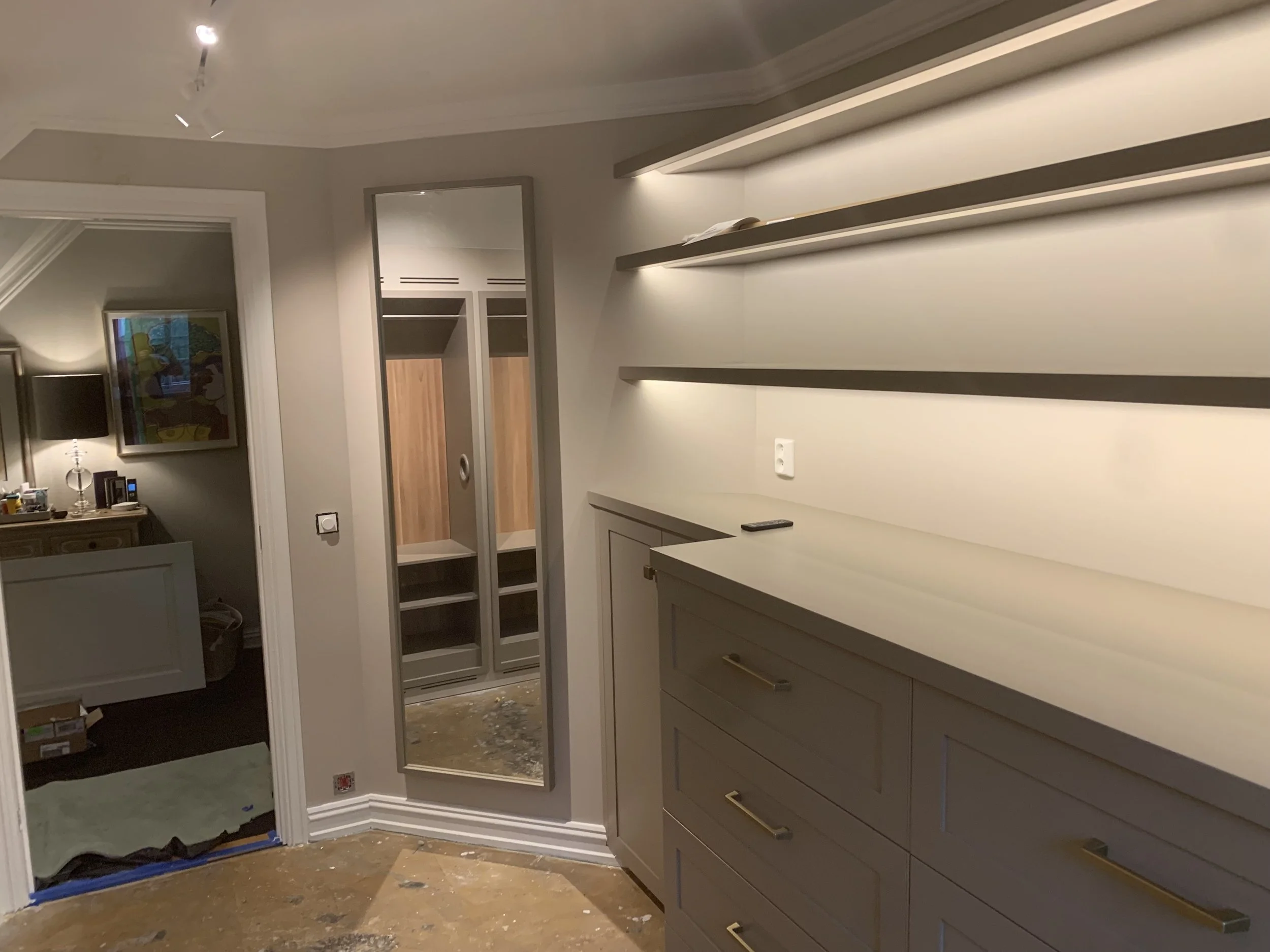 Custom walk-in closet, garderobe, carriage clothing system, cedar closet back panels, pull-out closets, made by Snekker Travis Johnson