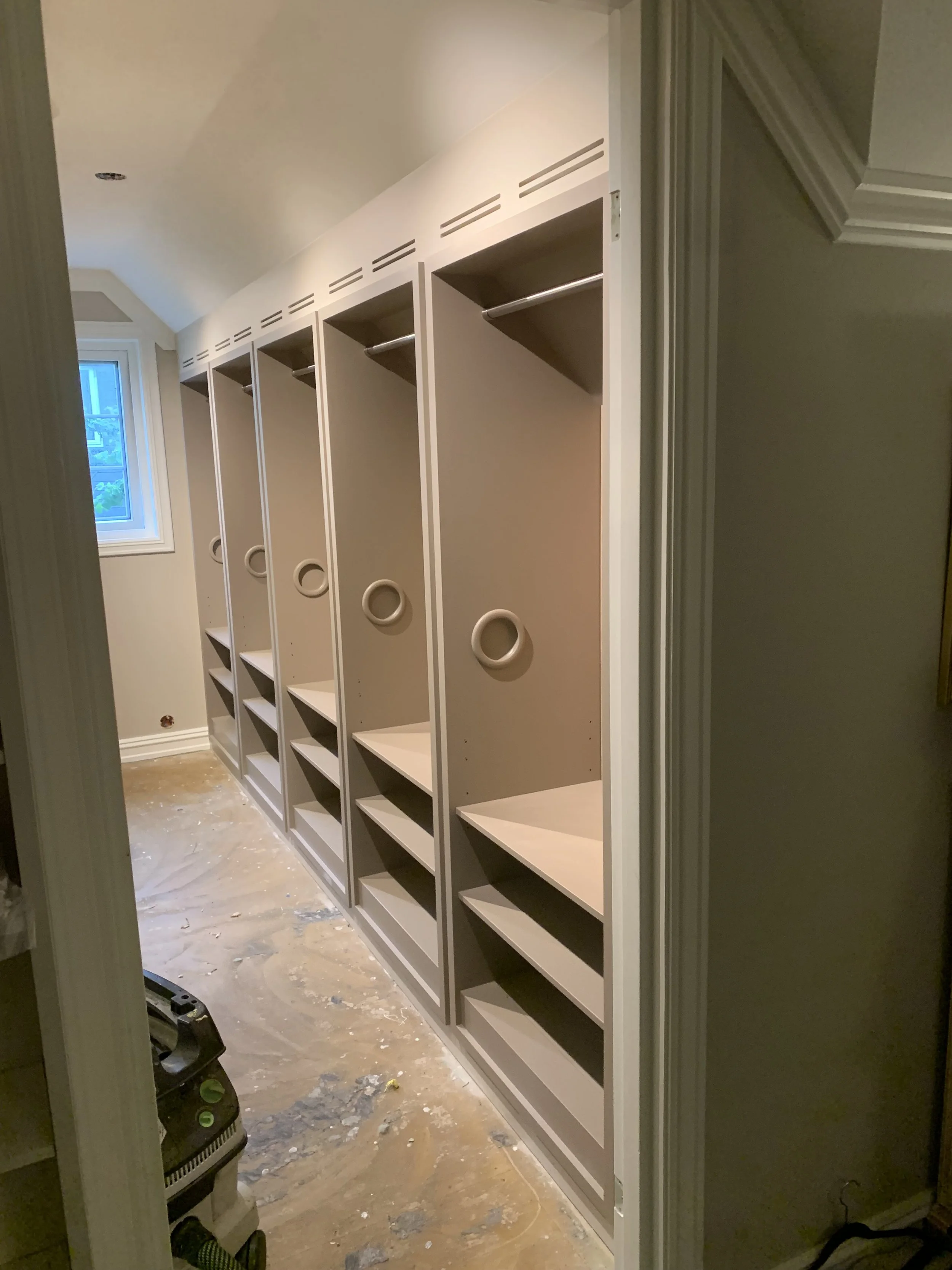 Custom walk-in closet, garderobe, carriage clothing system, cedar closet back panels, pull-out closets, made by Snekker Travis Johnson